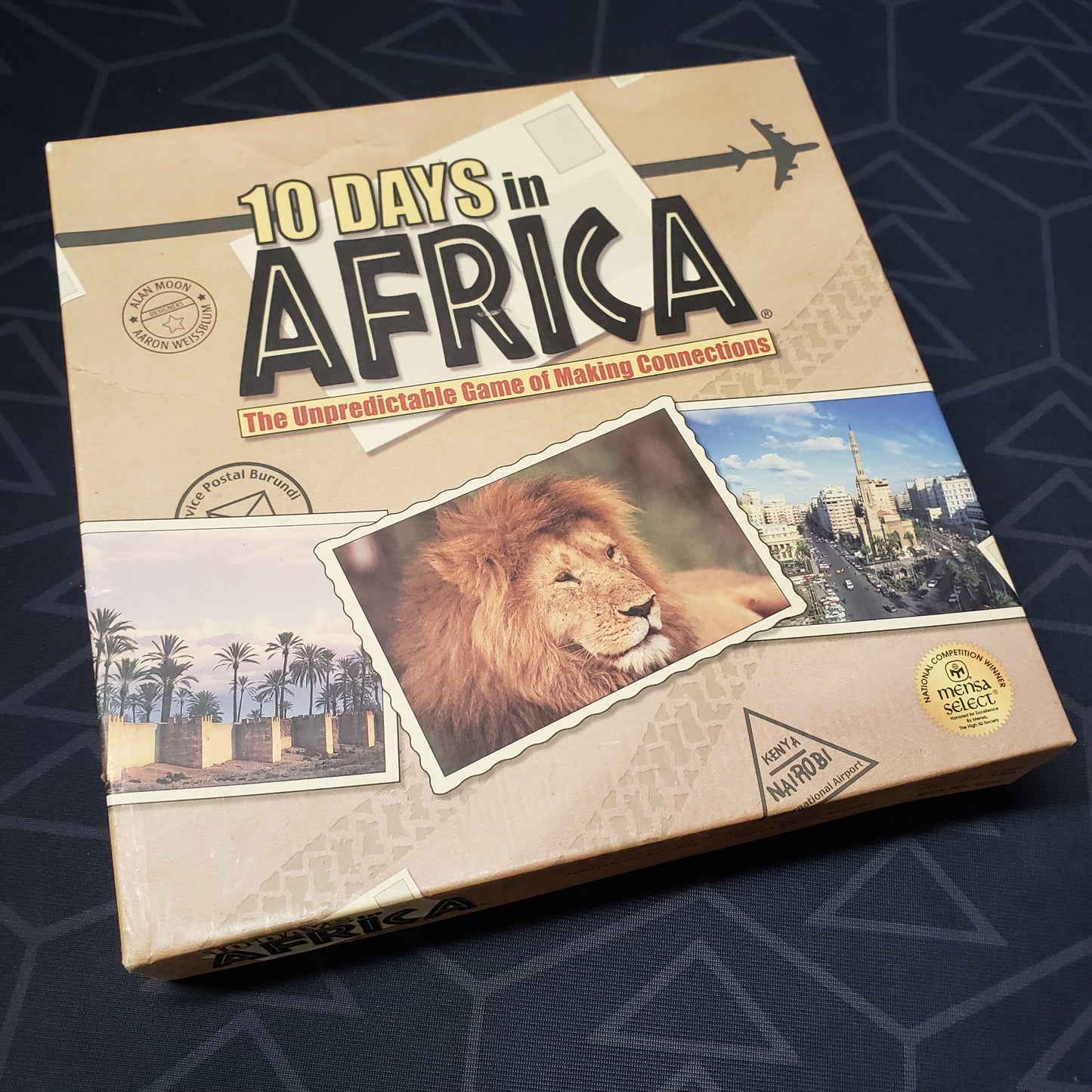 Image shows the front cover of the box for the 10 Days in Africa board game