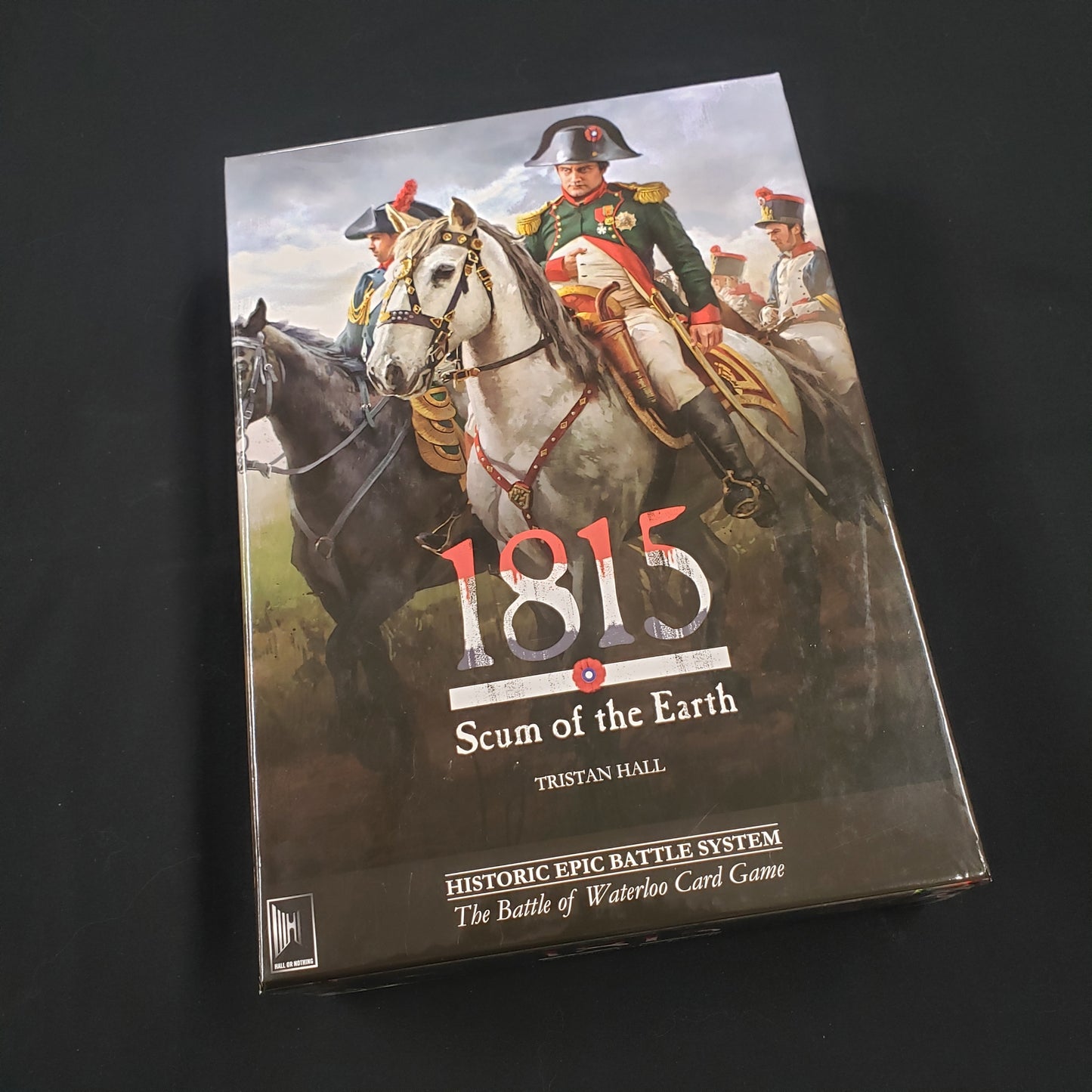 Image shows the front cover of the box of the 1815: Scum of the Earth board game