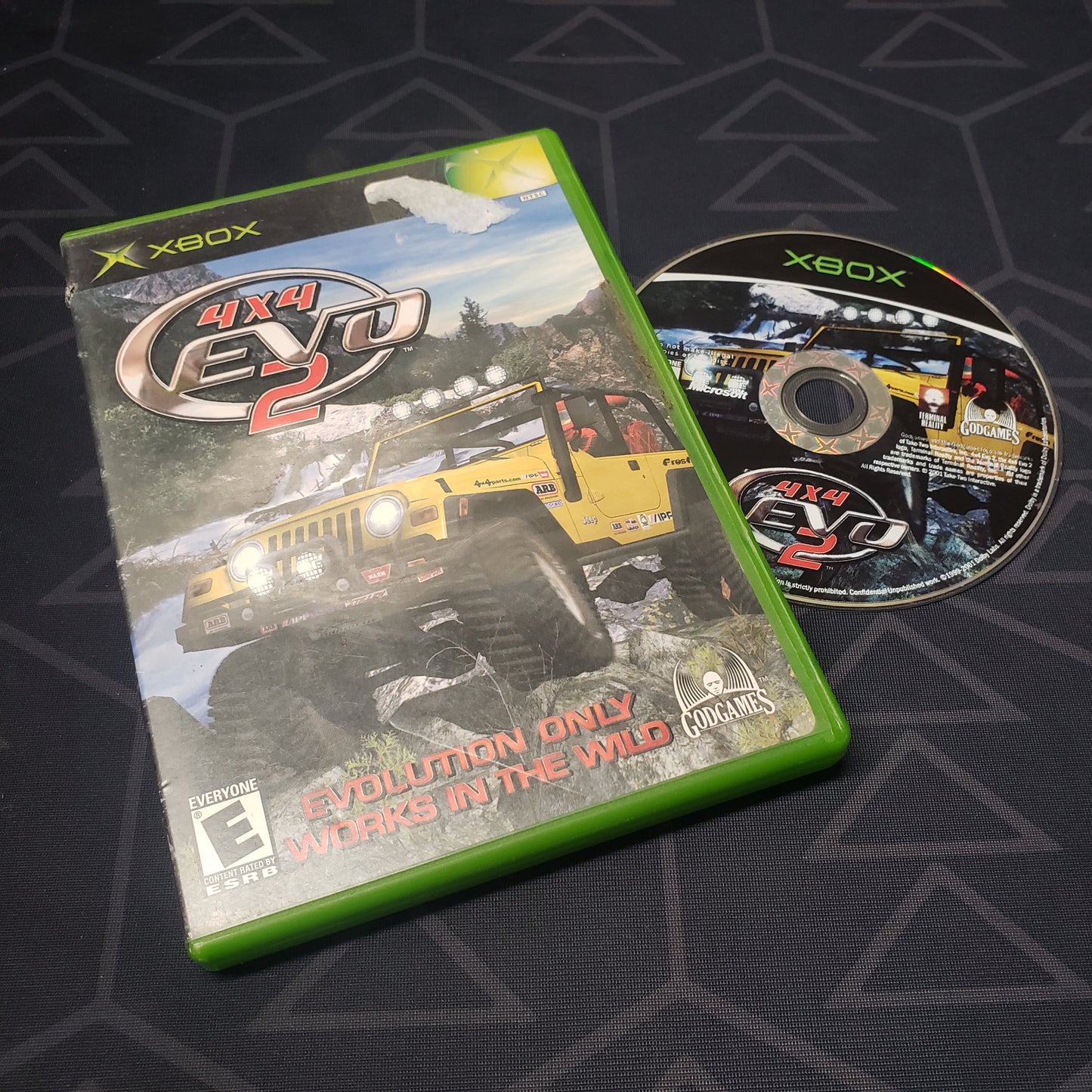 Image shows the case and disc for the video game 4x4 Evo 2 for the original Xbox