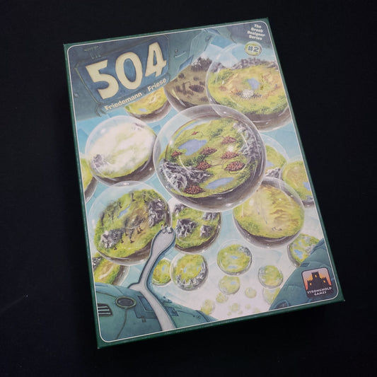 Image shows the front cover of the box of the board game 504
