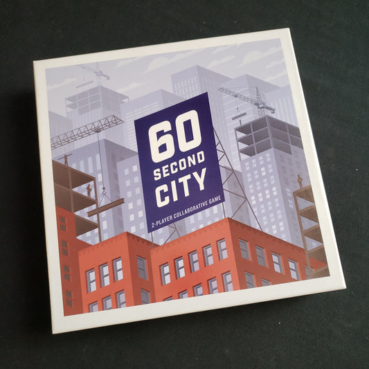 Image shows the front cover of the box of the 60 Second City board game