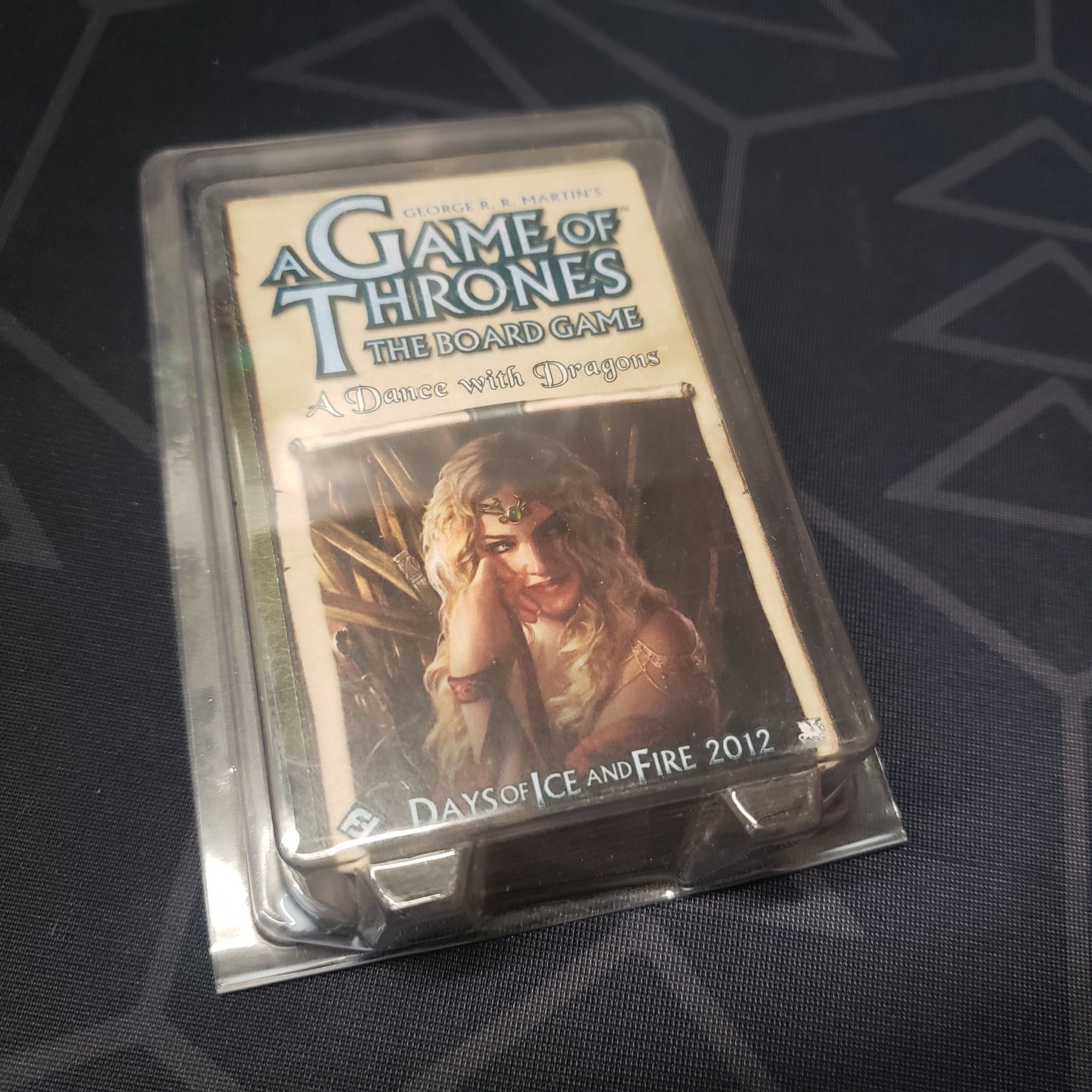 Image shows the front of the package for the Dance with Dragons Expansion for the Game of Thrones board game