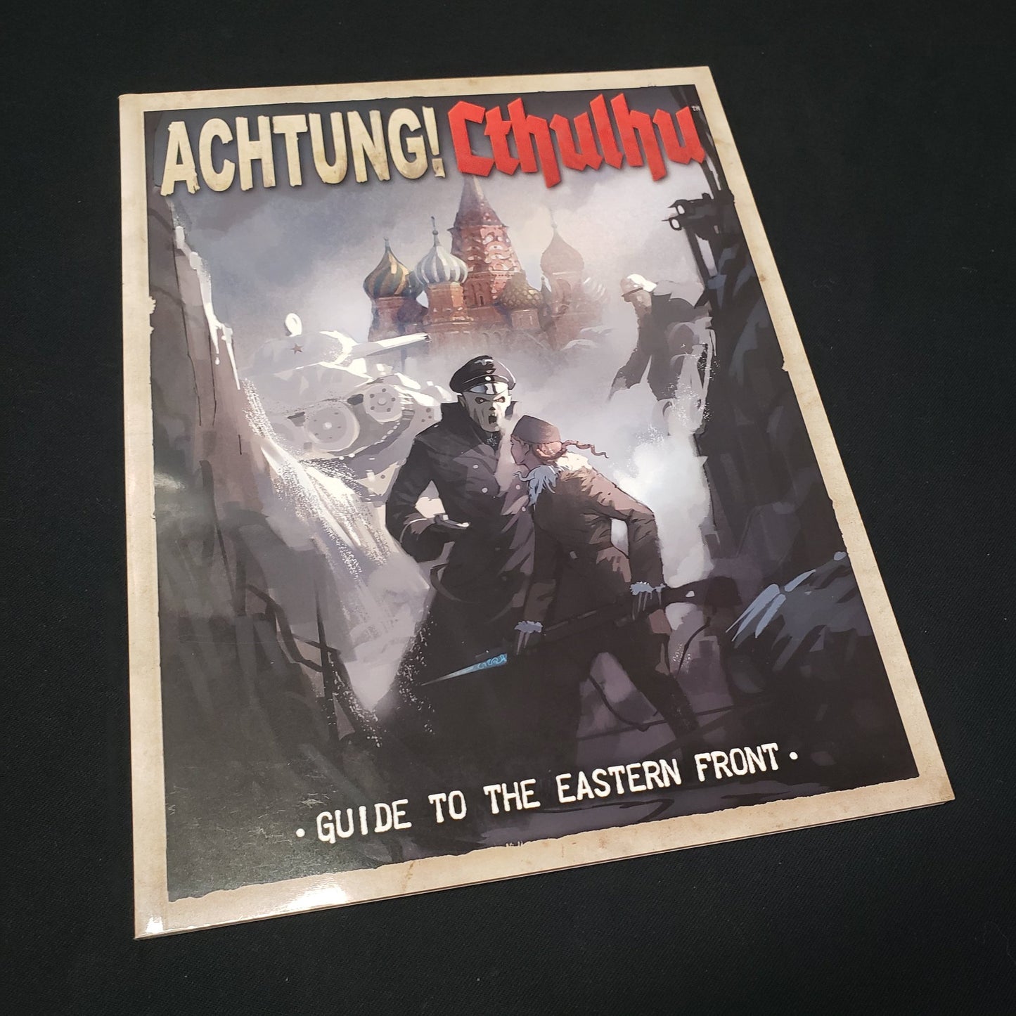 Image shows the front cover of the Guide to the Eastern Front book for the roleplaying game Achtung! Cthulhu