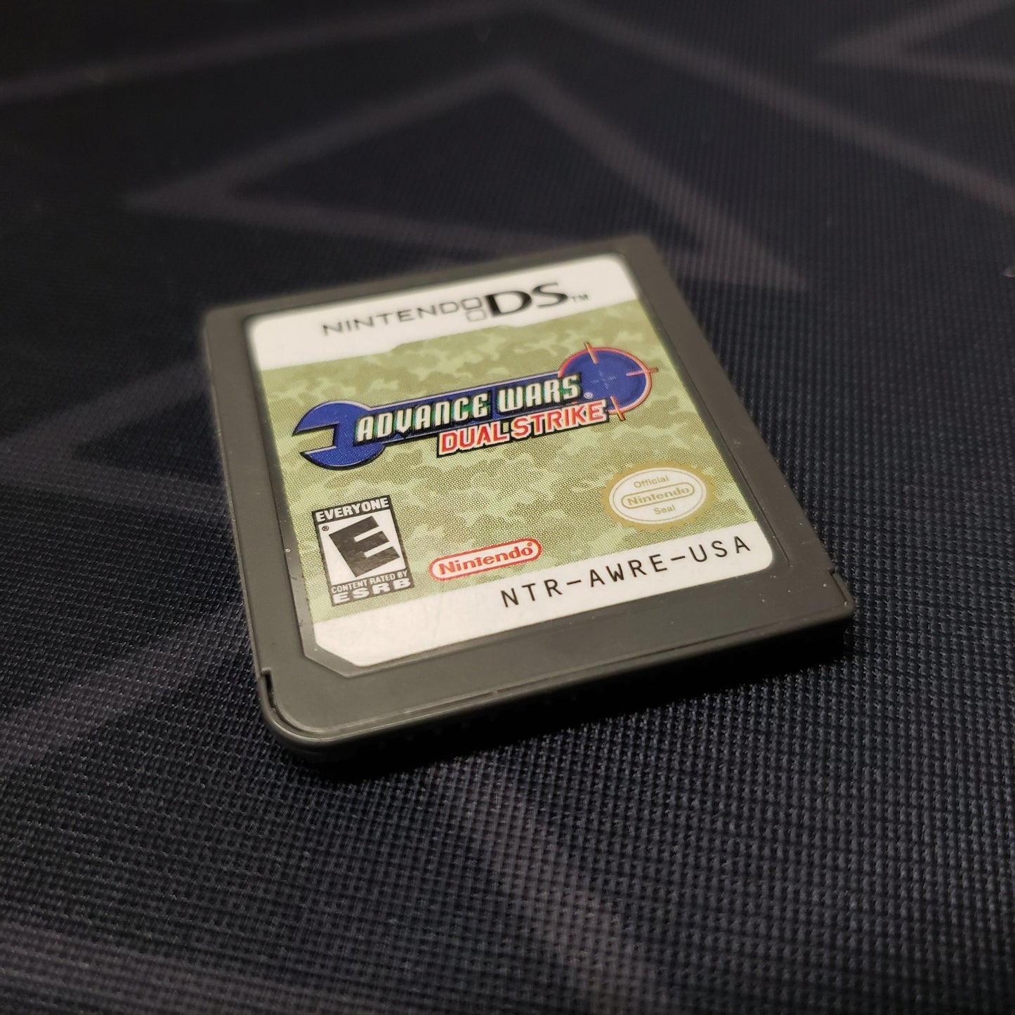 Image shows the front of the cartridge for the video game Advance Wars: Dual Strike for Nintendo DS