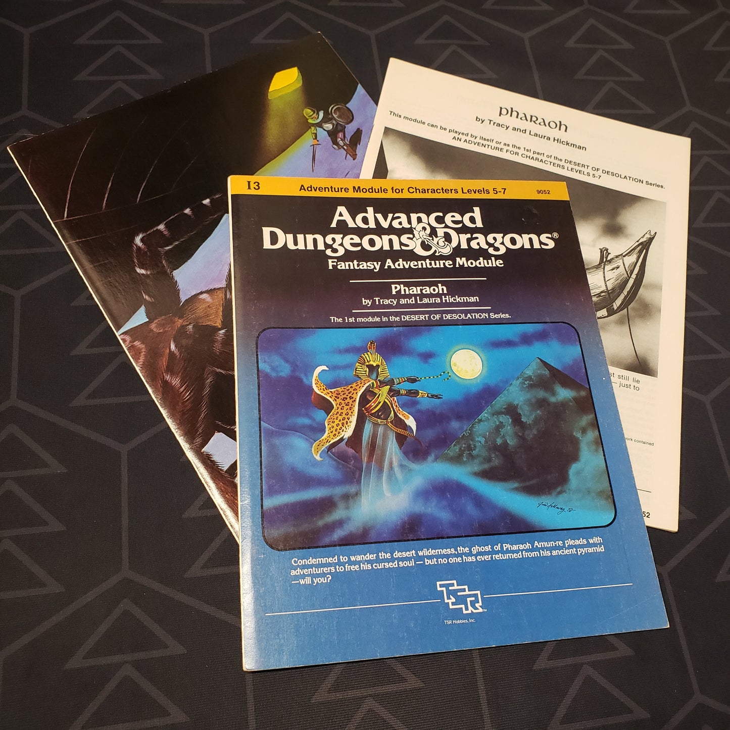Image shows the front cover of the folio for the Pharaoh adventure module for the roleplaying game Advanced Dungeons & Dragons 1E with the booklet & map insert fanned out