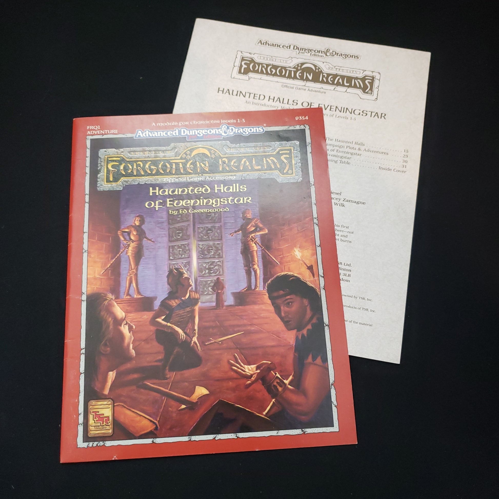 Image shows the front folio cover & booklet of the Haunted Halls of Eveningstar module for the Advanced Dungeons & Dragons roleplaying game