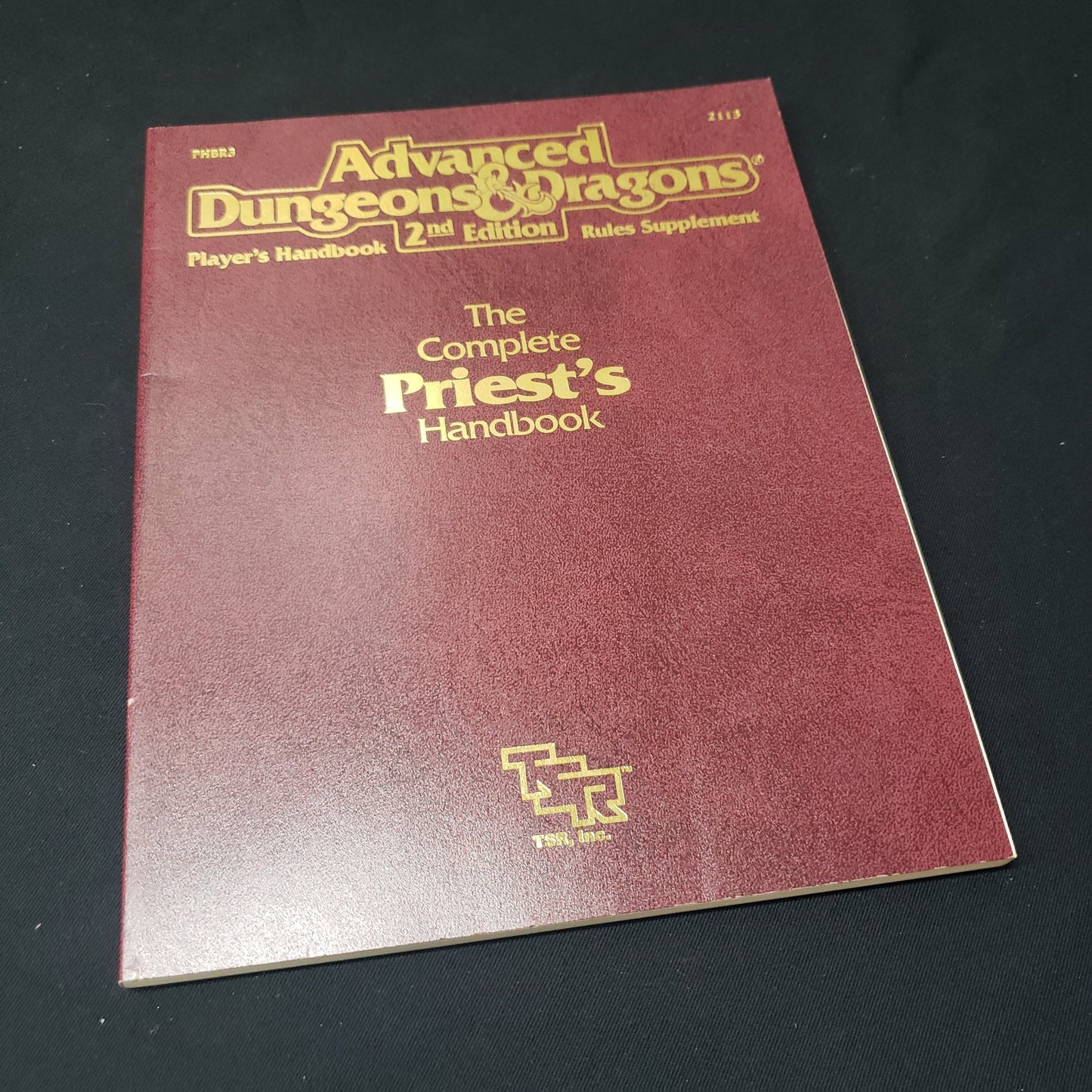 Image shows the front cover of the Complete Priest's Handbook for the roleplaying game Advanced Dungeons & Dragons: Second Edition