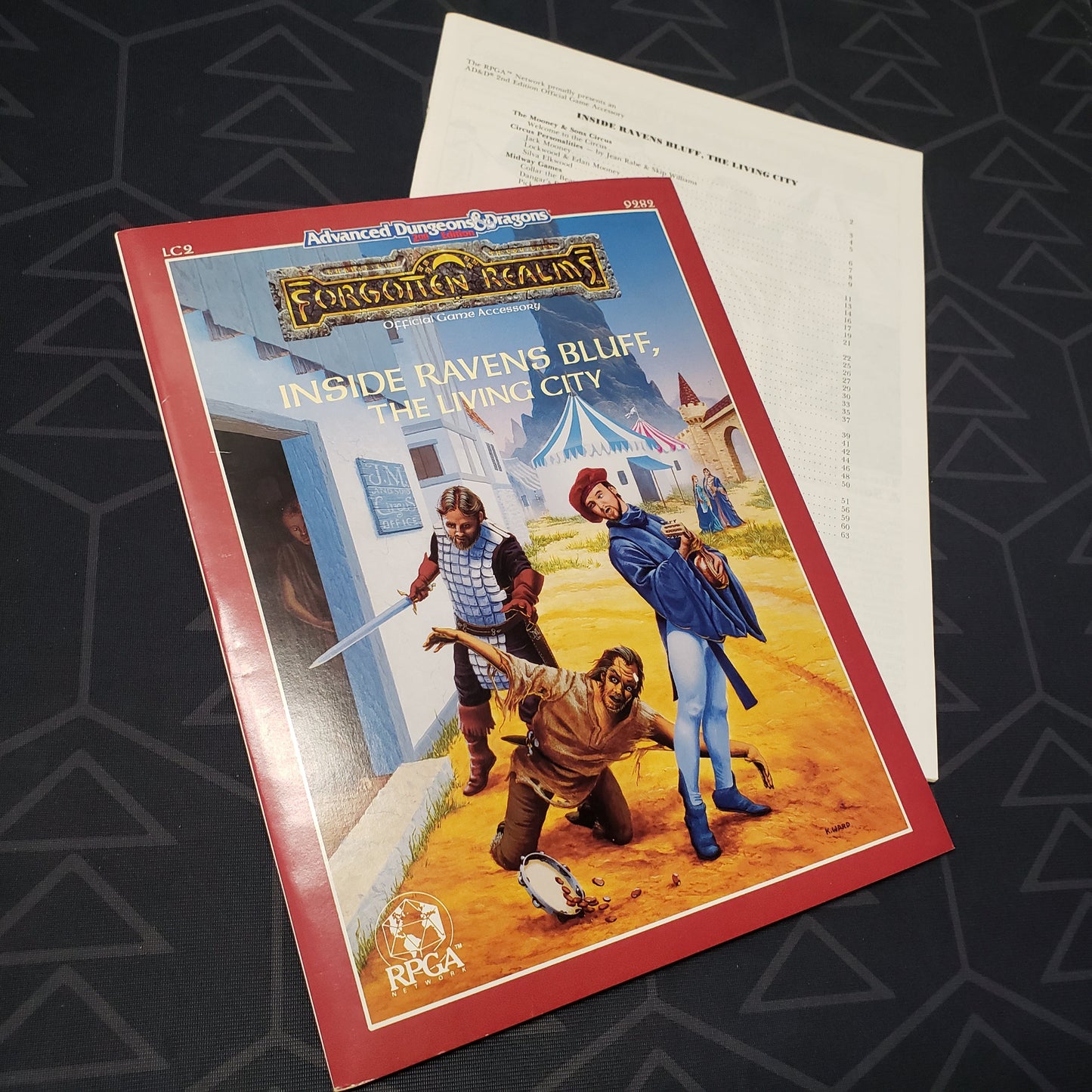 Image shows the front cover of the folio for the Forgotten Realms: Inside Ravens Bluff, The Living City adventure module for the roleplaying game Advanced Dungeons & Dragons 2E with the booklet fanned out