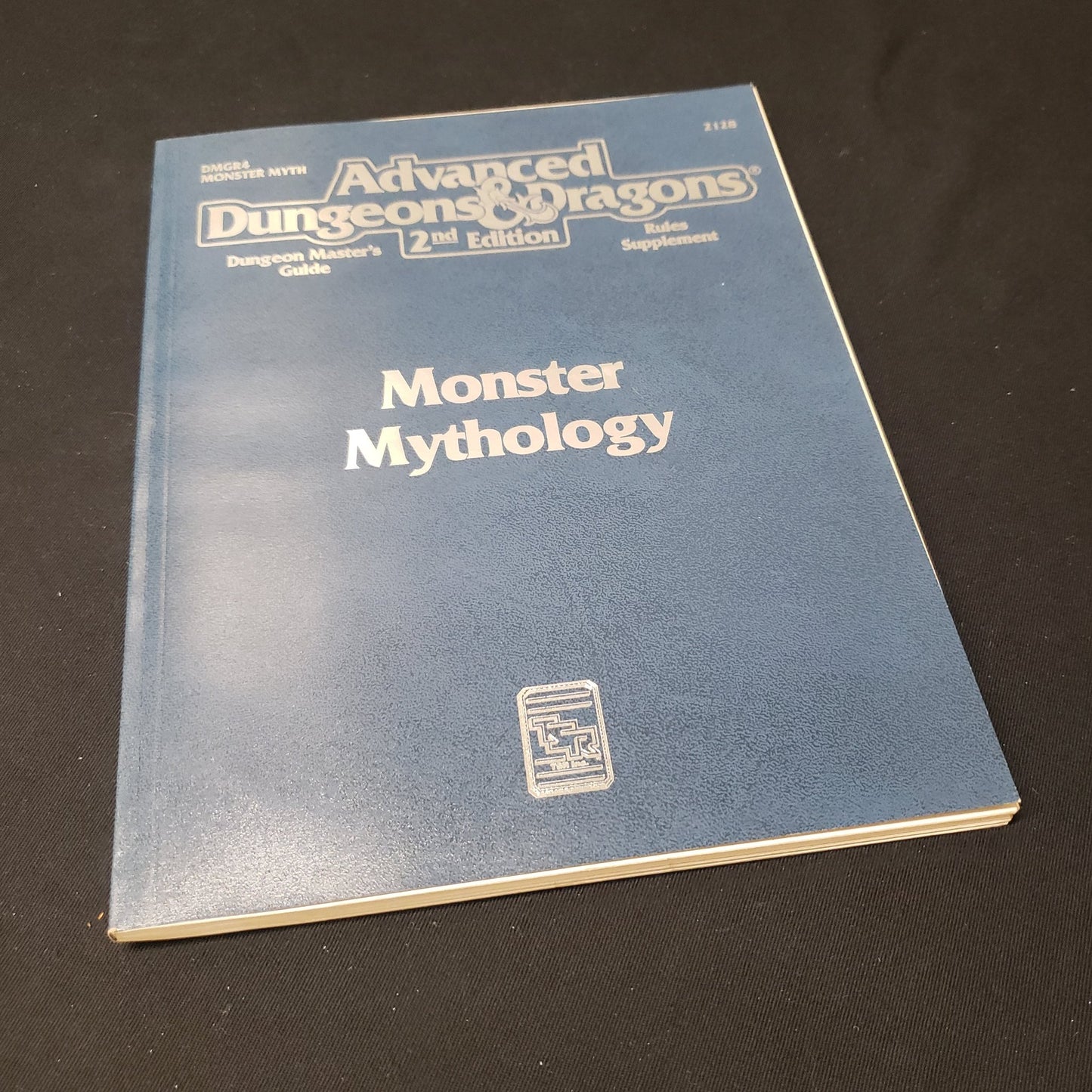 Image shows the front cover of the Monster Mythology book for the roleplaying game Advanced Dungeons & Dragons: Second Edition