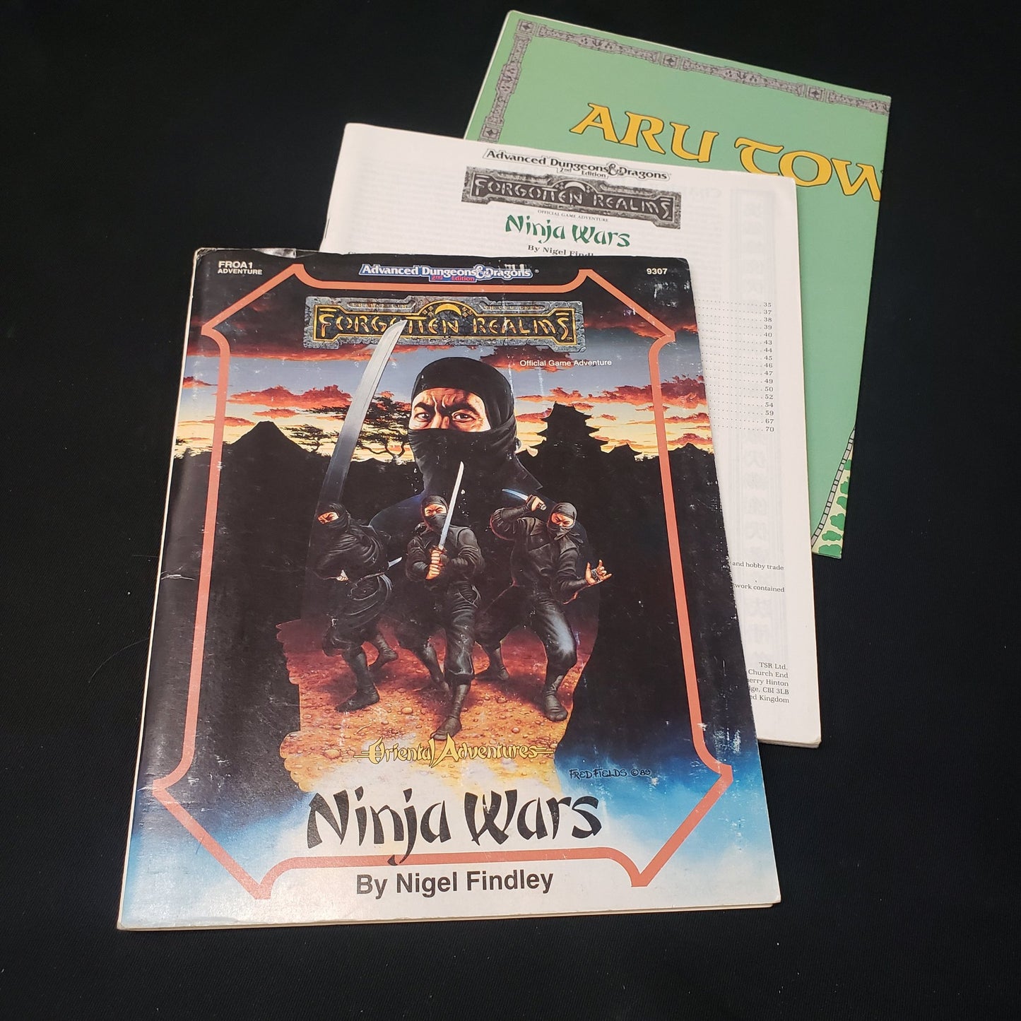 Image shows the front cover of the folio, map & the booklet of the Ninja Wars adventure module for the roleplaying game Advanced Dungeons & Dragons: Second Edition