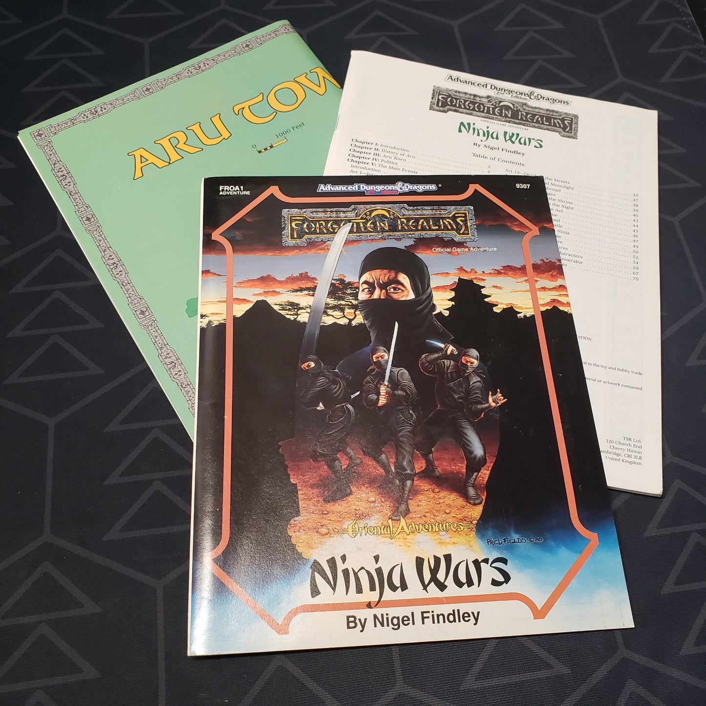 Image shows the front cover of the folio, map & the booklet of the Ninja Wars adventure module for the roleplaying game Advanced Dungeons & Dragons: Second Edition