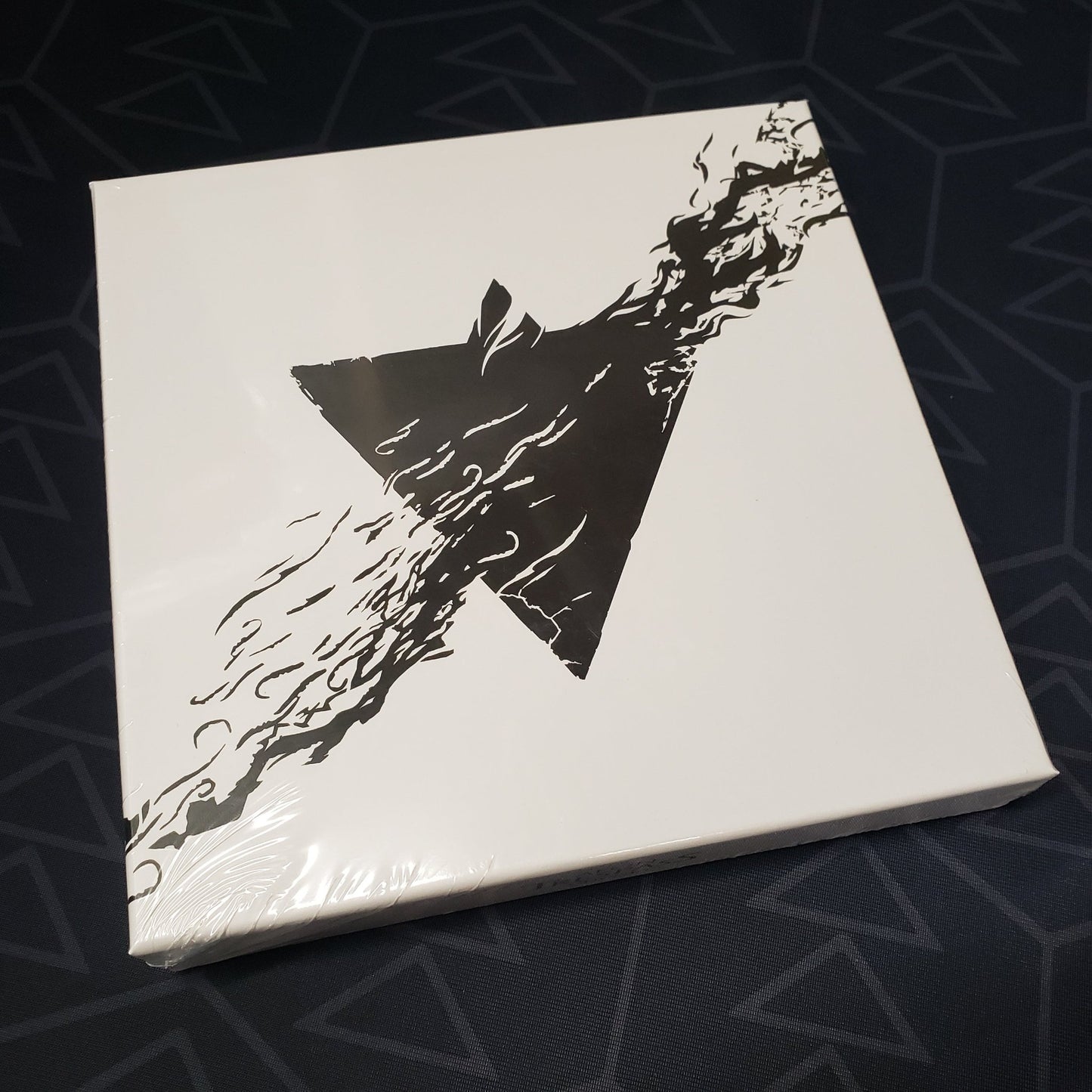 Image shows the front cover of the box of the Luxury Tiles II expansion for the board game Aeon Trespass Odyssey