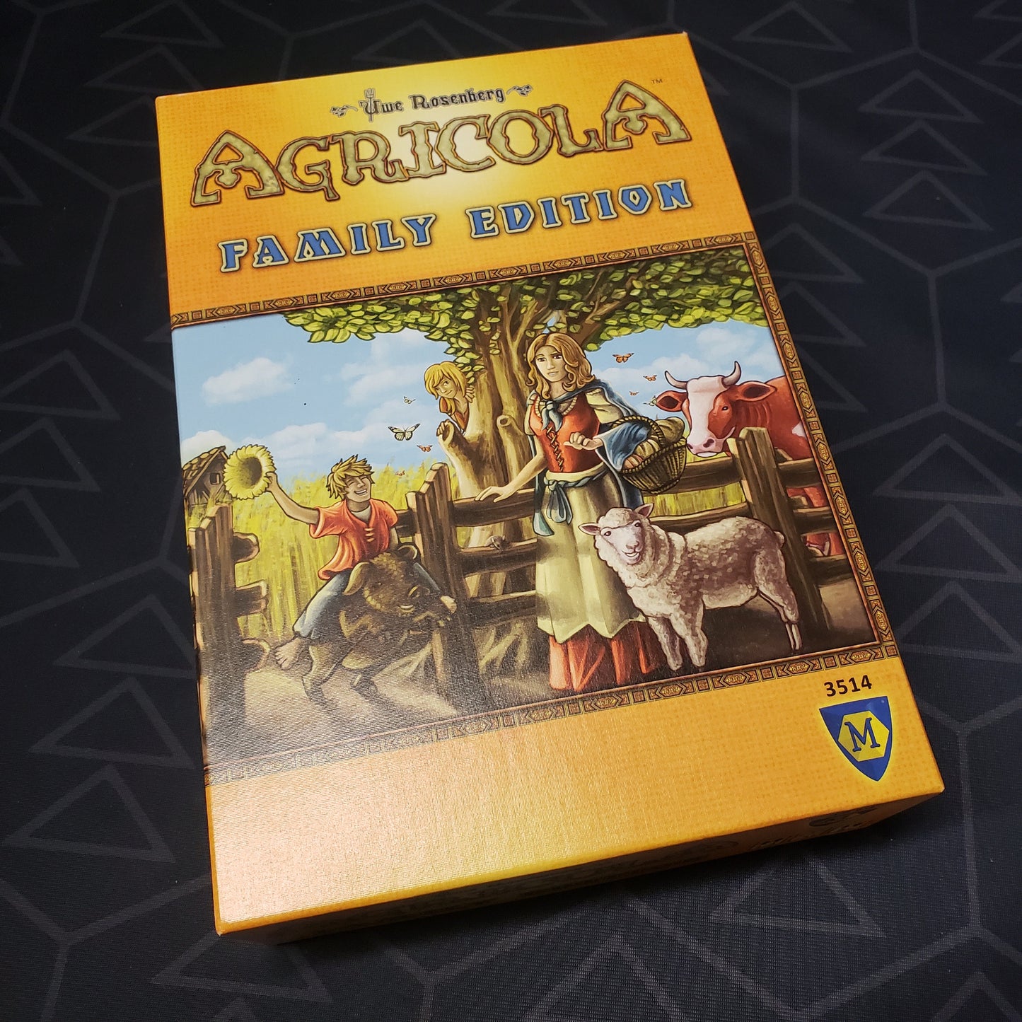 Image shows the front cover of the box for the board game Agricola: Family Edition