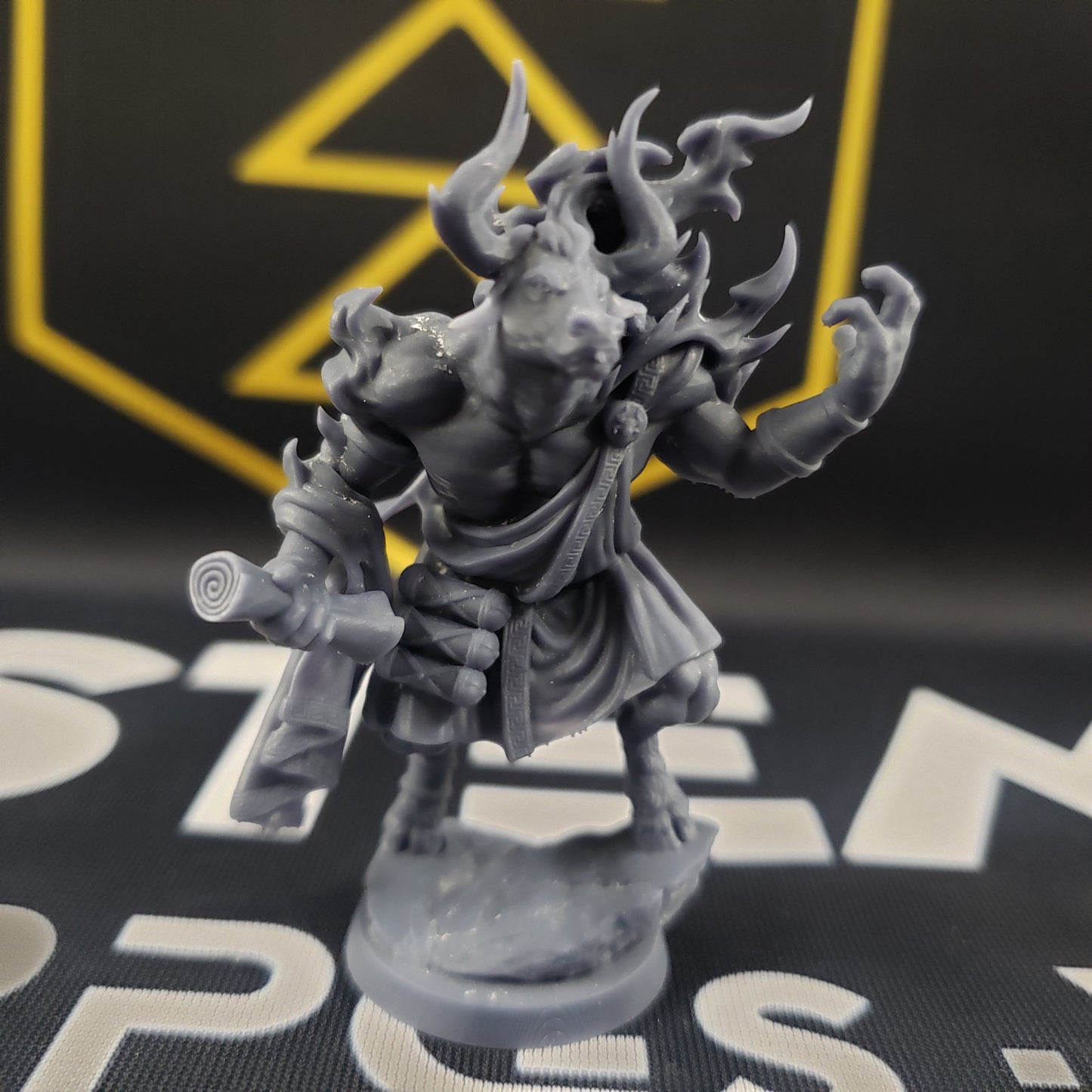 Image shows a 3D printed minotaur god gaming miniature.