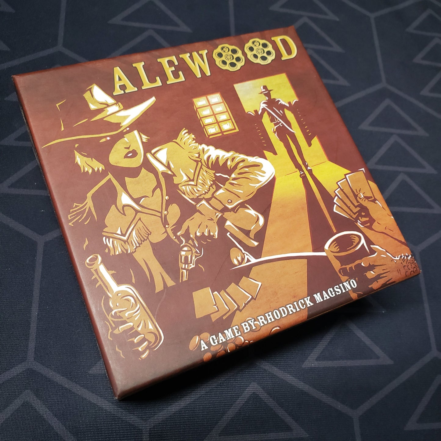 Image shows the front cover of the box for the Alewood card game