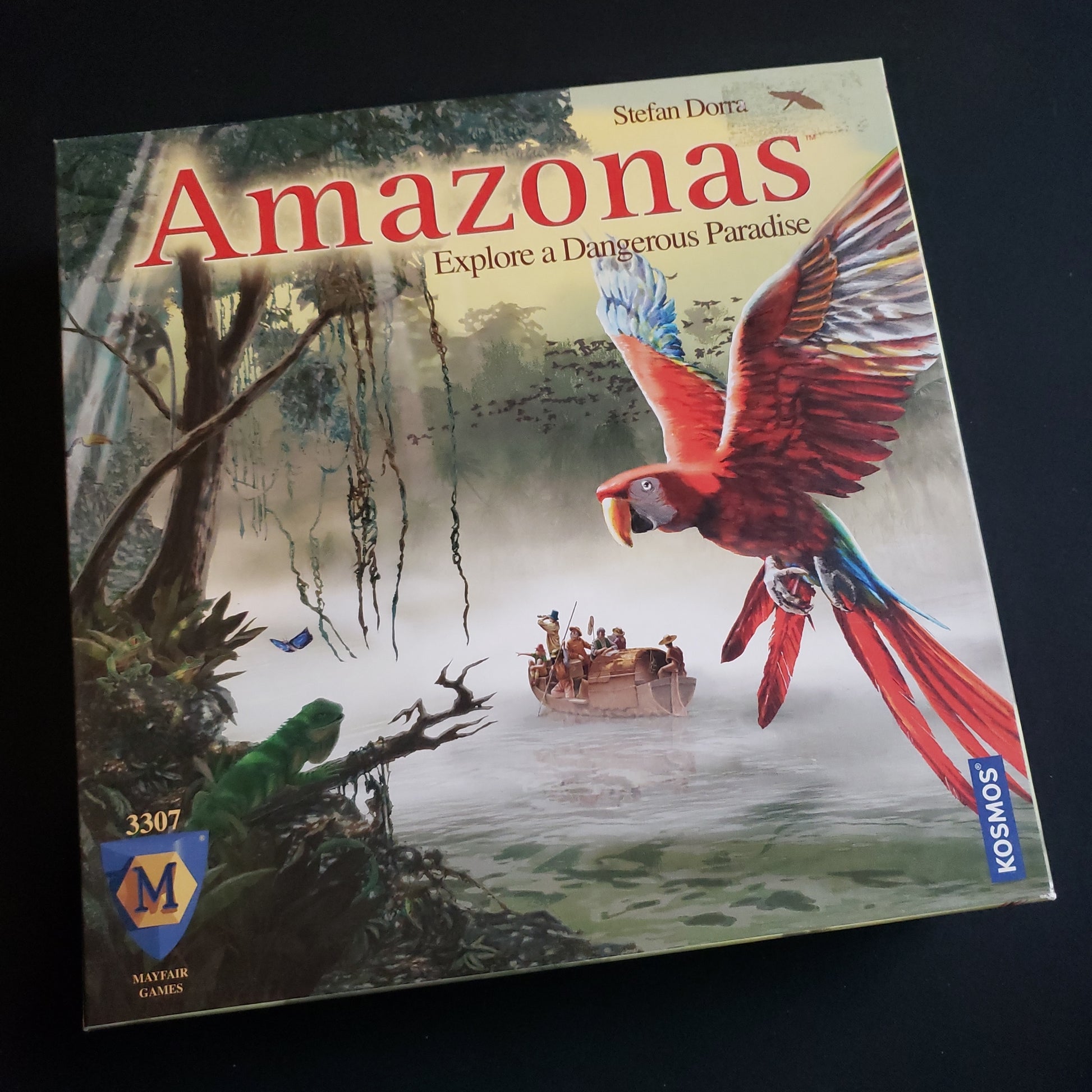 Image shows the front cover of the box of the Amazonas board game