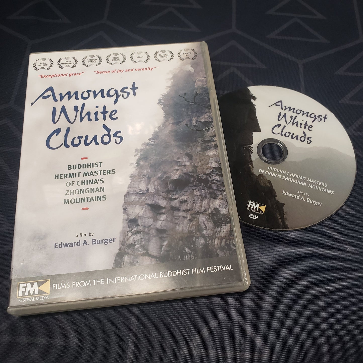 Image shows the case & disc for the movie Amongst White Clouds on DVD