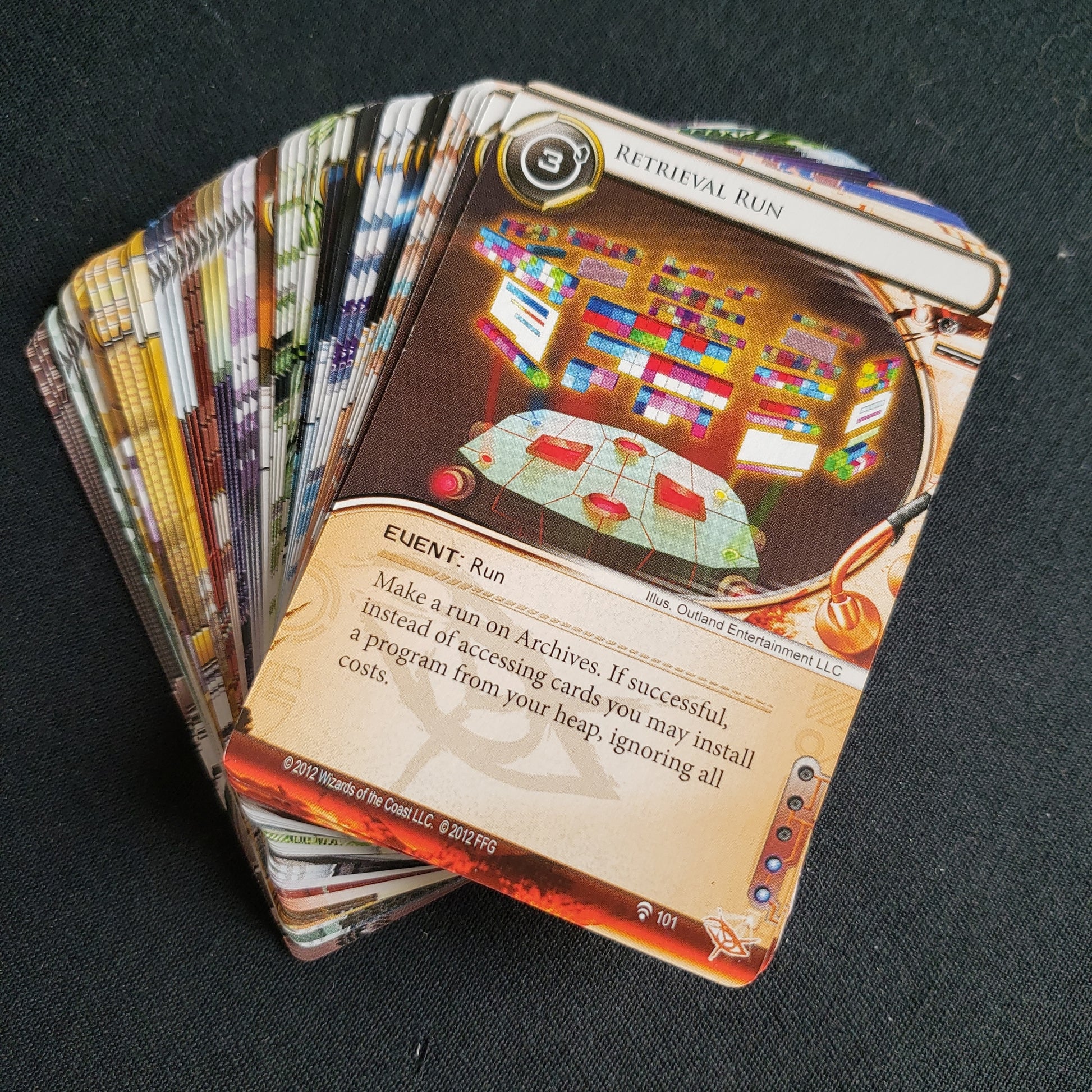 Image shows a deck of fanned out cards from the Future Proof Data Pack for the Android: Netrunner card game