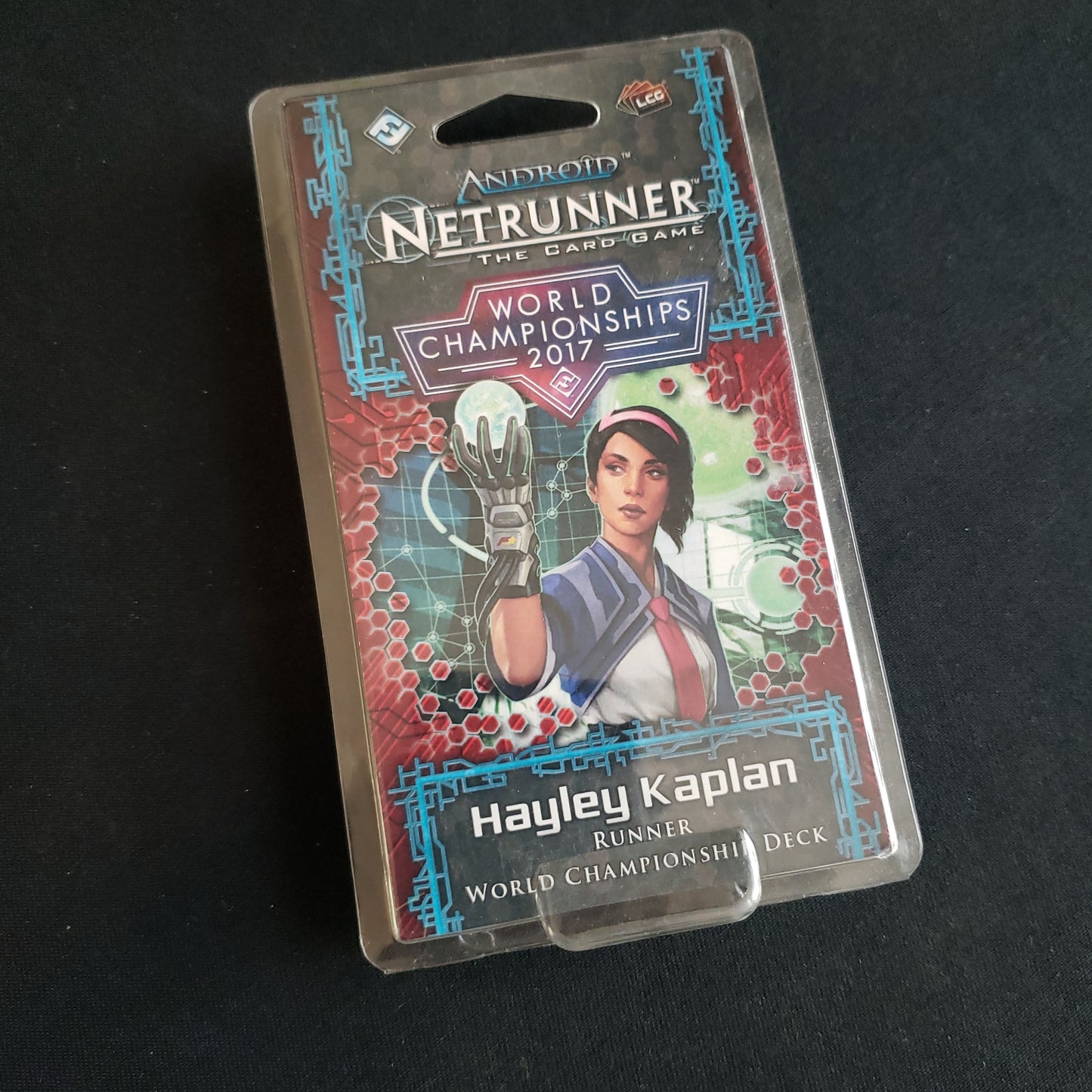 Image shows the front of the package for the Hayley Kaplan 2017 World Championship Deck for the Android: Netrunner card game