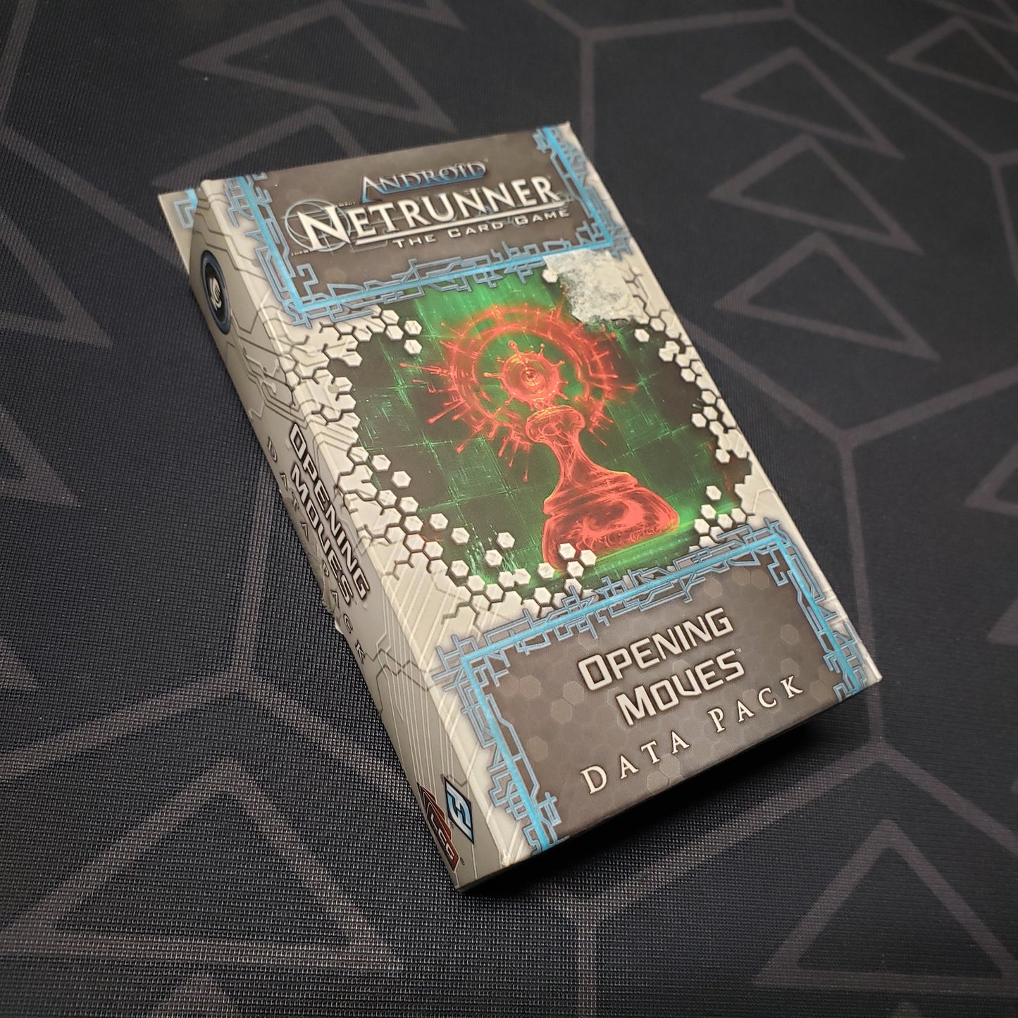 Image shows the front of the package of the Opening Moves Data Pack for the card game Android Netrunner