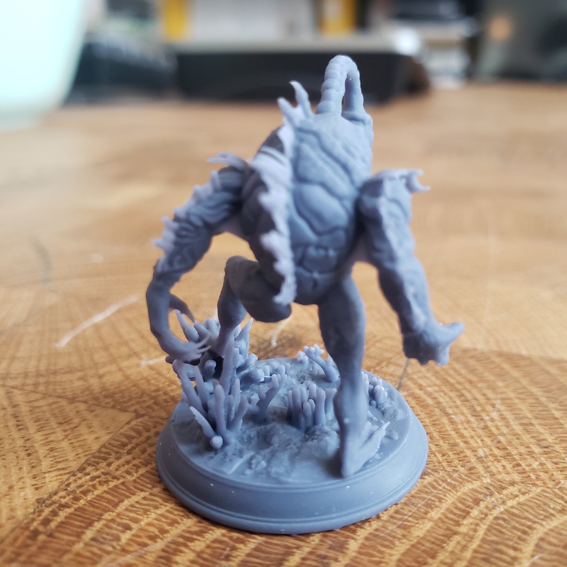 Image shows an example of a 3D printed fishfolk horror gaming miniature printed in-house at All Systems Go