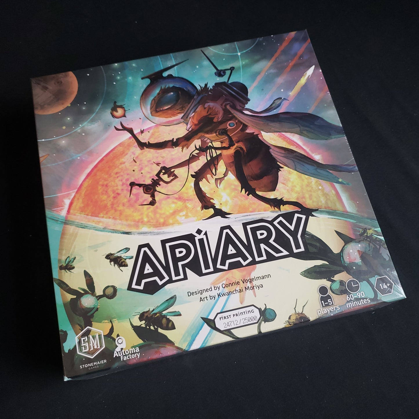 Image shows the front cover of the box of the Apiary board game