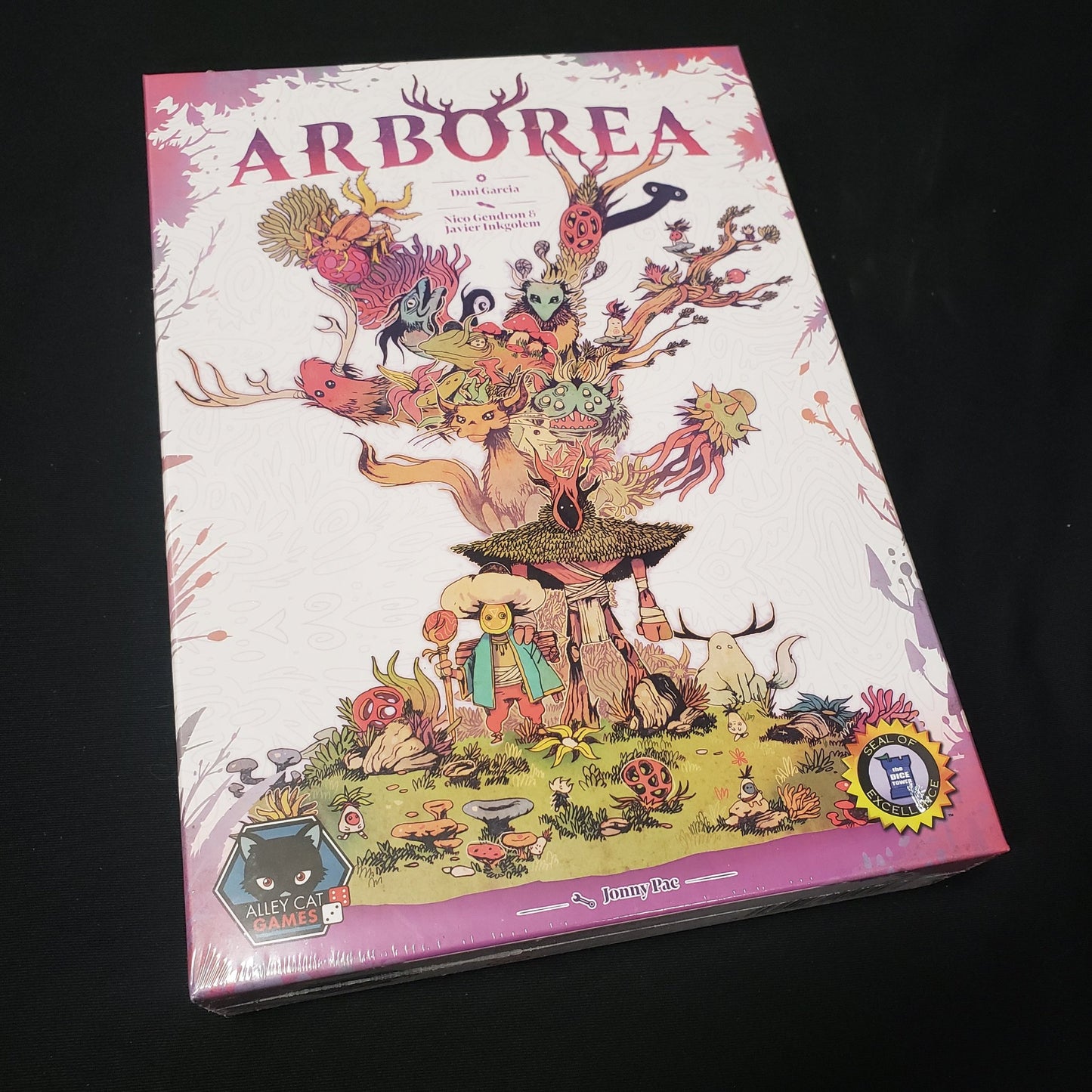 Image shows the front cover of the box of the Arborea board game