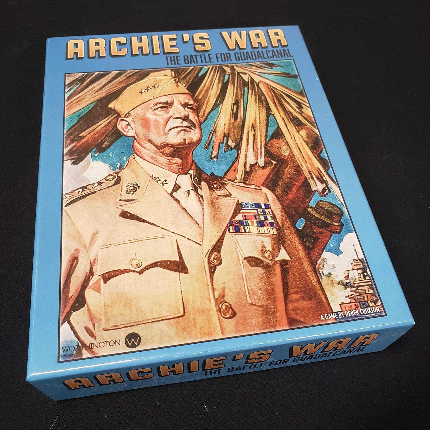 Image shows the front cover of the box of the board game Archie's War: The Battle for Guadalcanal