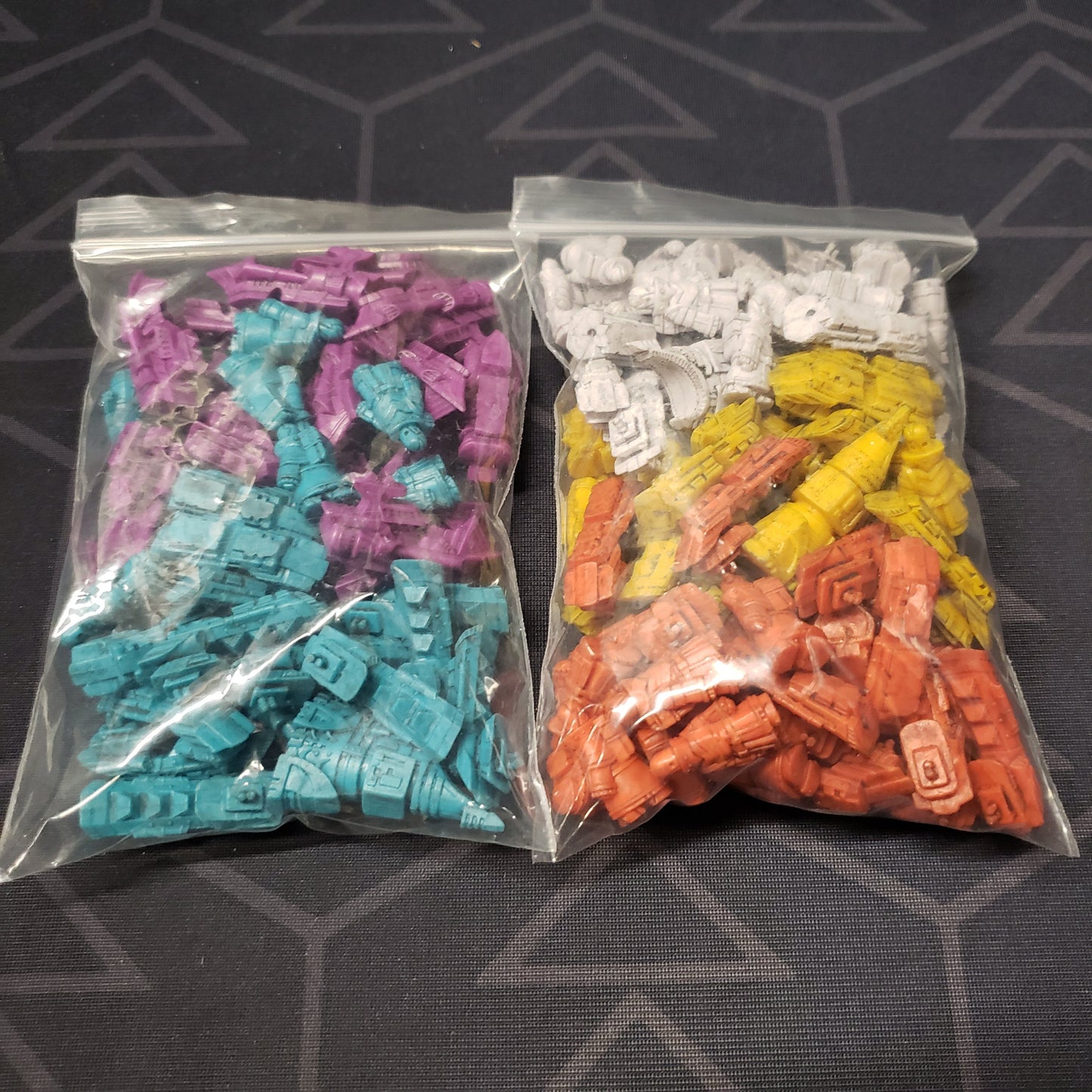 Image shows the bagged components of the Miniatures Pack for the board game Arcs