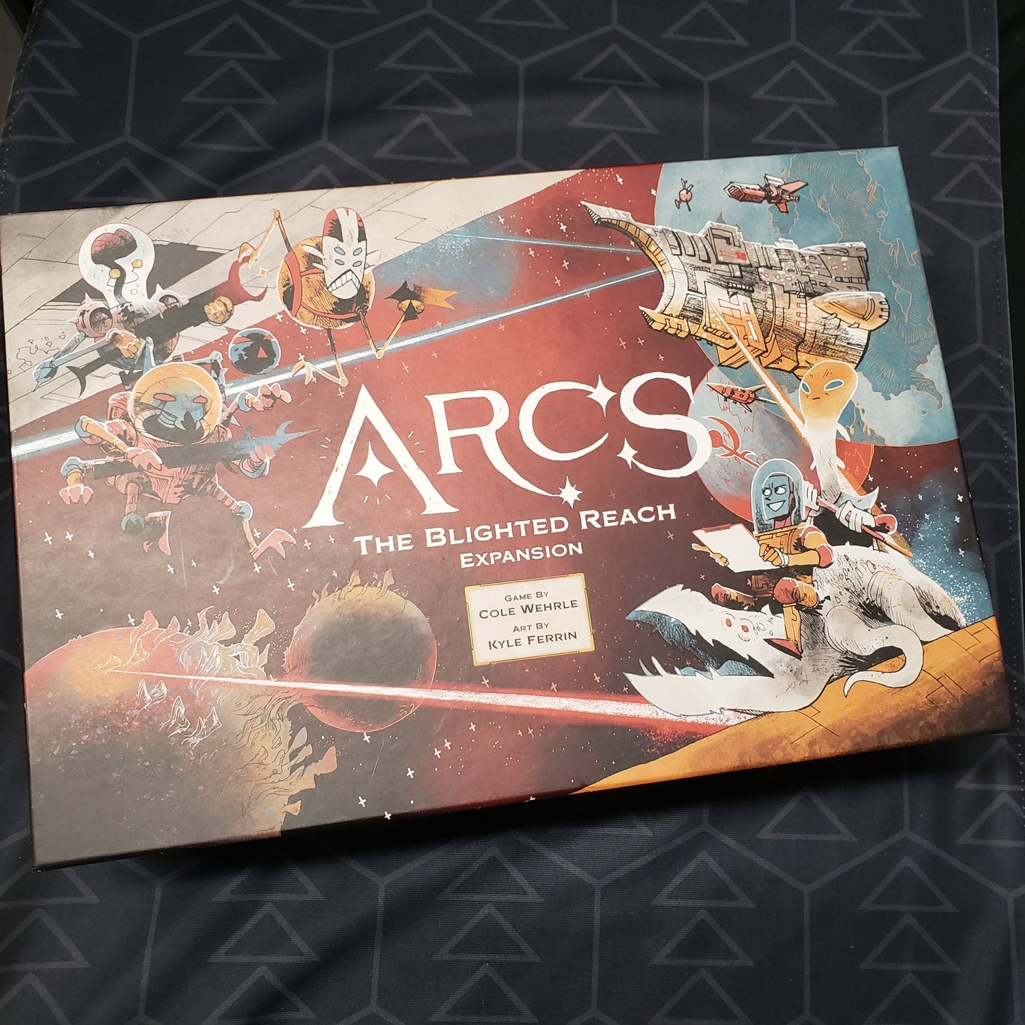 Image shows the front cover of the box of the Blighted Reach expansion for the board game Arcs