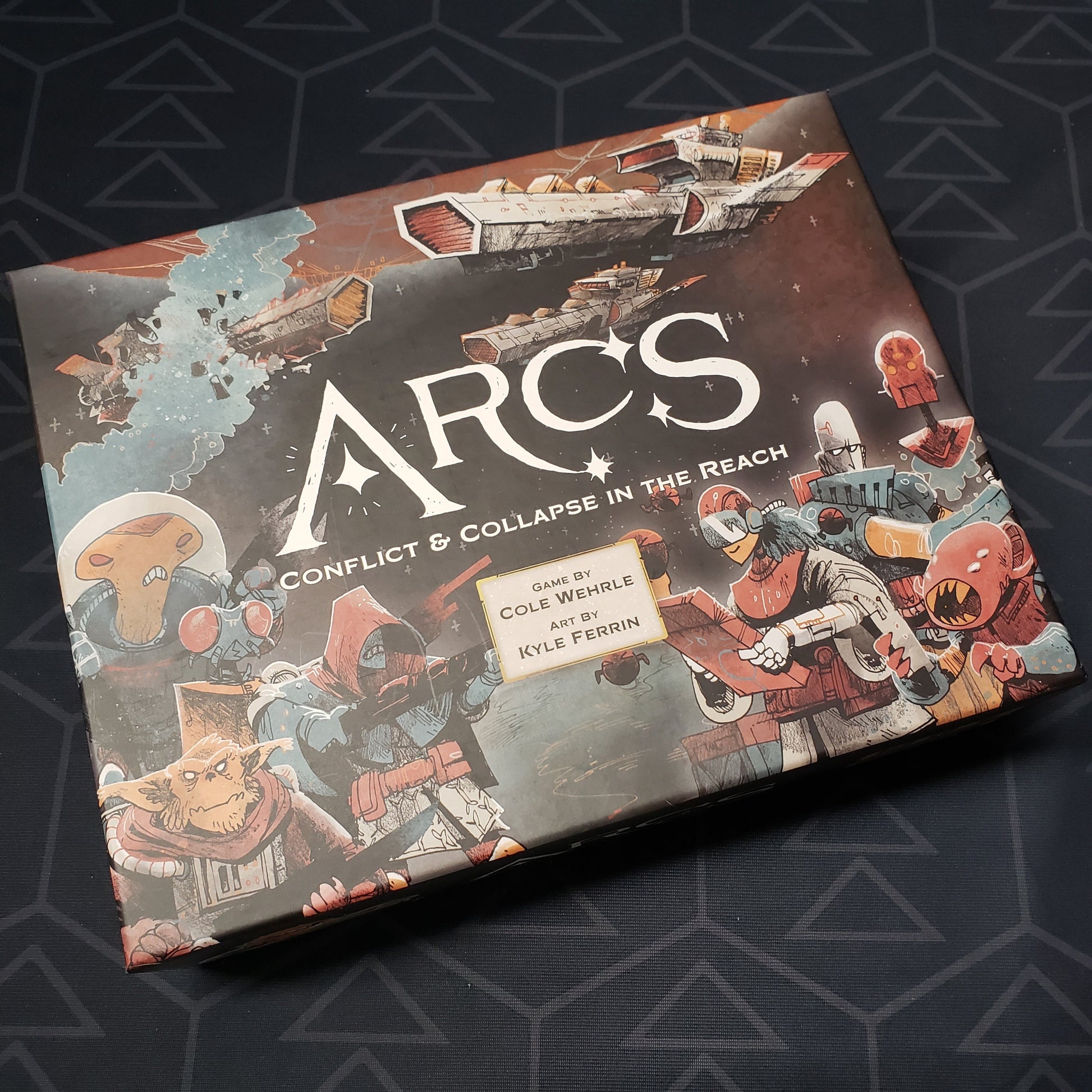 Image shows the front cover of the box of the Arcs board game