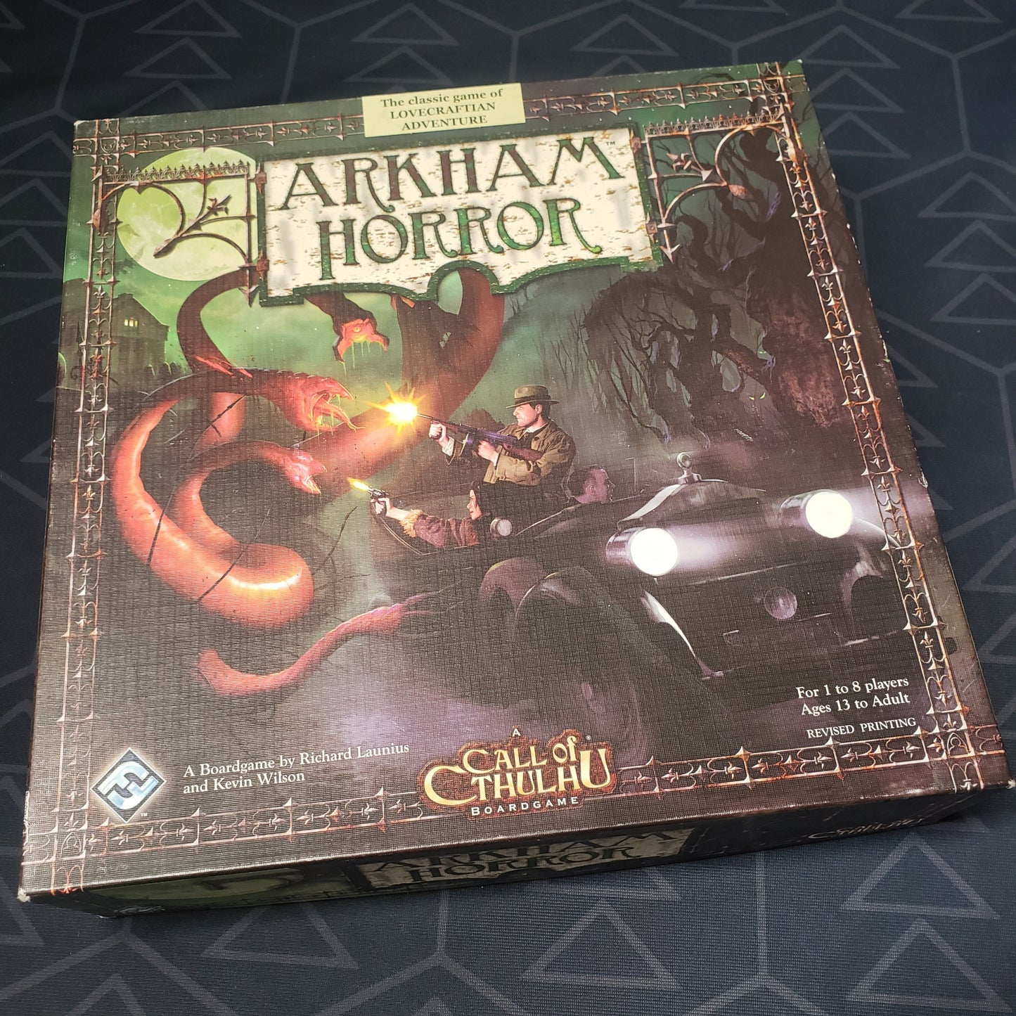 Image shows the front cover of the box of the Arkham Horror board game
