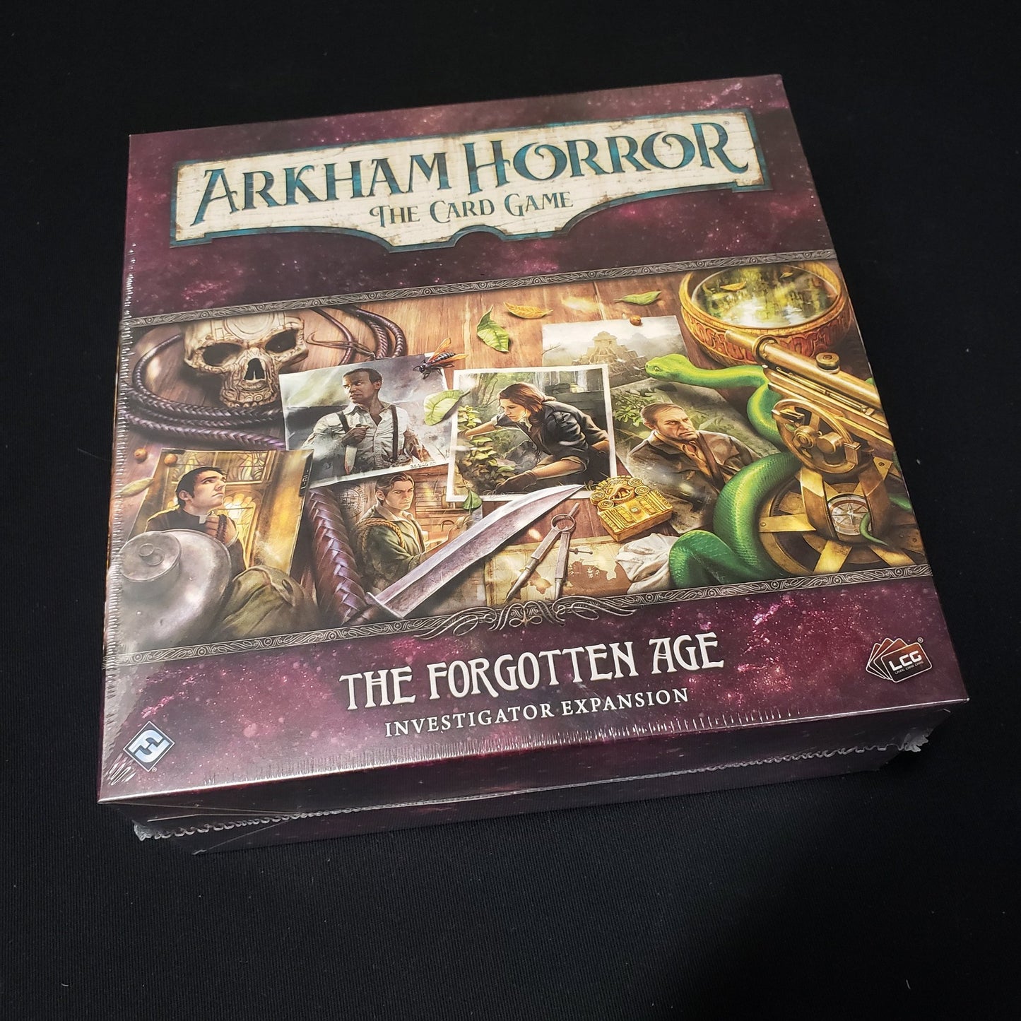 Image shows the front cover of the box of the Forgotten Age Investigator expansion for the Arkham Horror card game