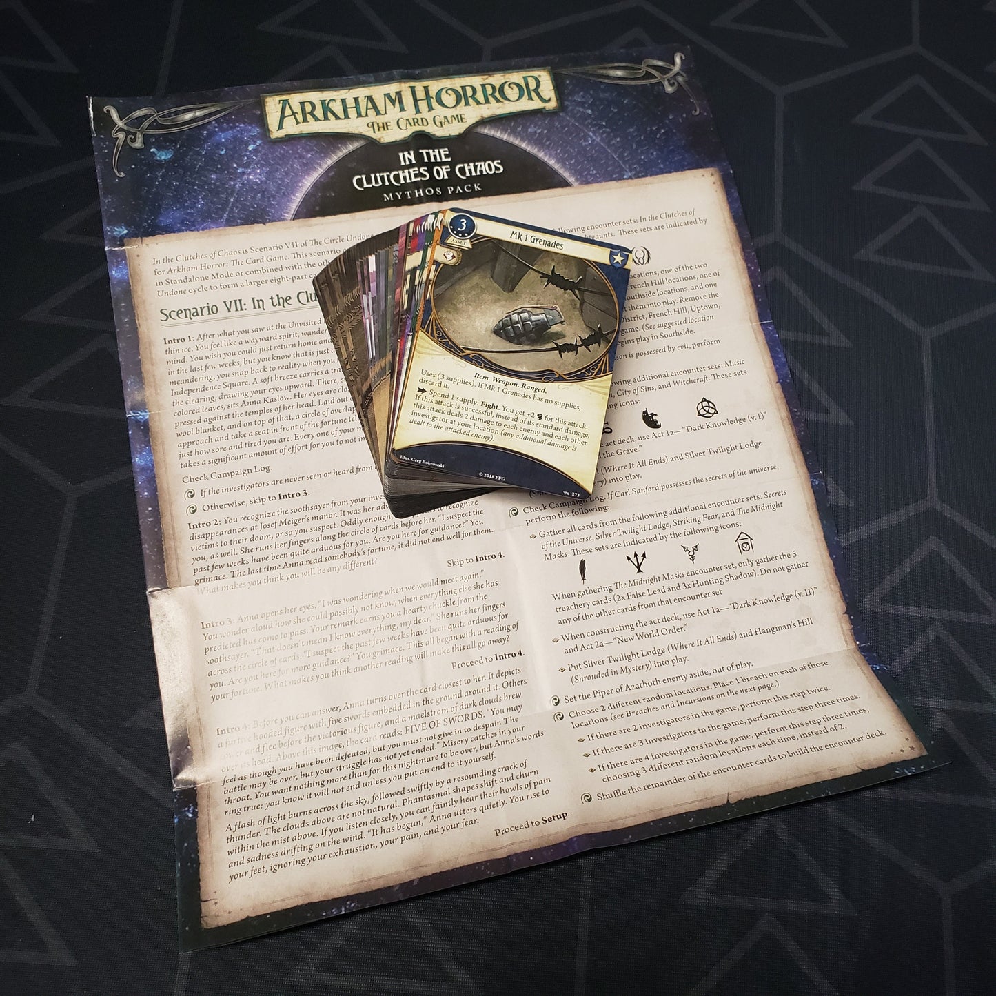 Image shows the cards & instruction sheet for the In the Clutches of Chaos Mythos pack for the card game Arkham Horror