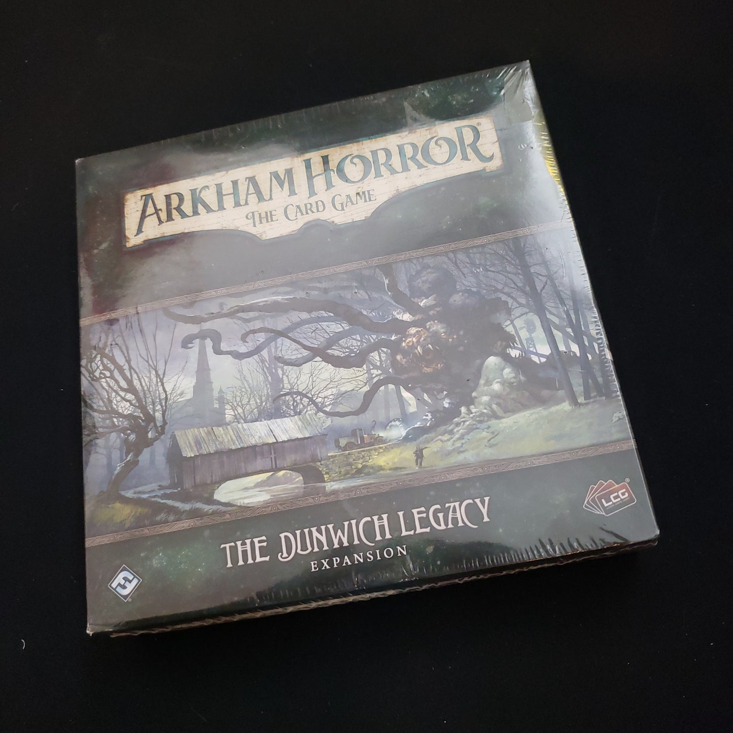 Image shows the front of the box for the Dunwich Legacy expansion for the Arkham Horror card game