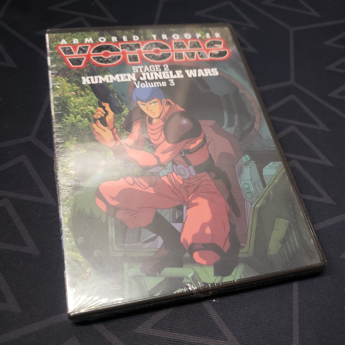 Image shows the front of the case for the Stage 2, Volume 3: Kummen Jungle Wars episode disc of the anime TV series Armored Trooper Votoms on DVD