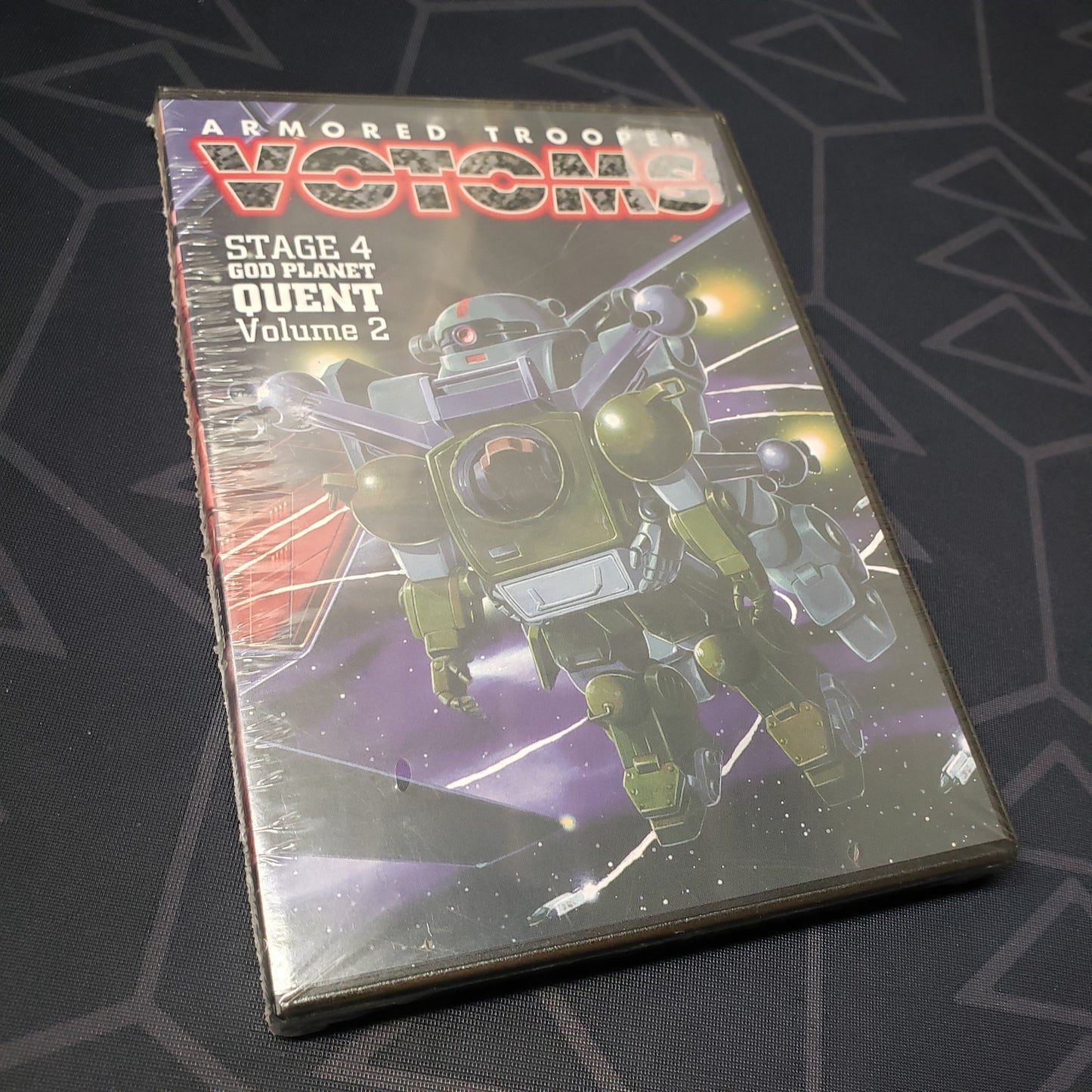 Image shows the front of the case for the Stage 4, Volume 2: God Planet Quent episode disc of the anime TV series Armored Trooper Votoms on DVD