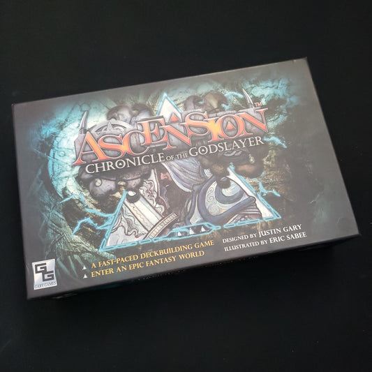 Image shows the front cover of the box of the Ascension: Chronicle of the Godslayer card game