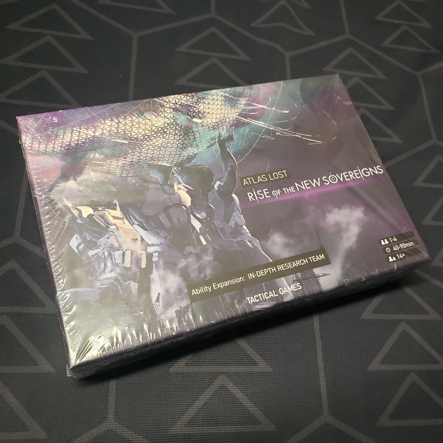 Image shows the front cover of the box of the In-Depth Research Team Ability expansion for the board game Atlas Lost: Rise of the New Sovereigns