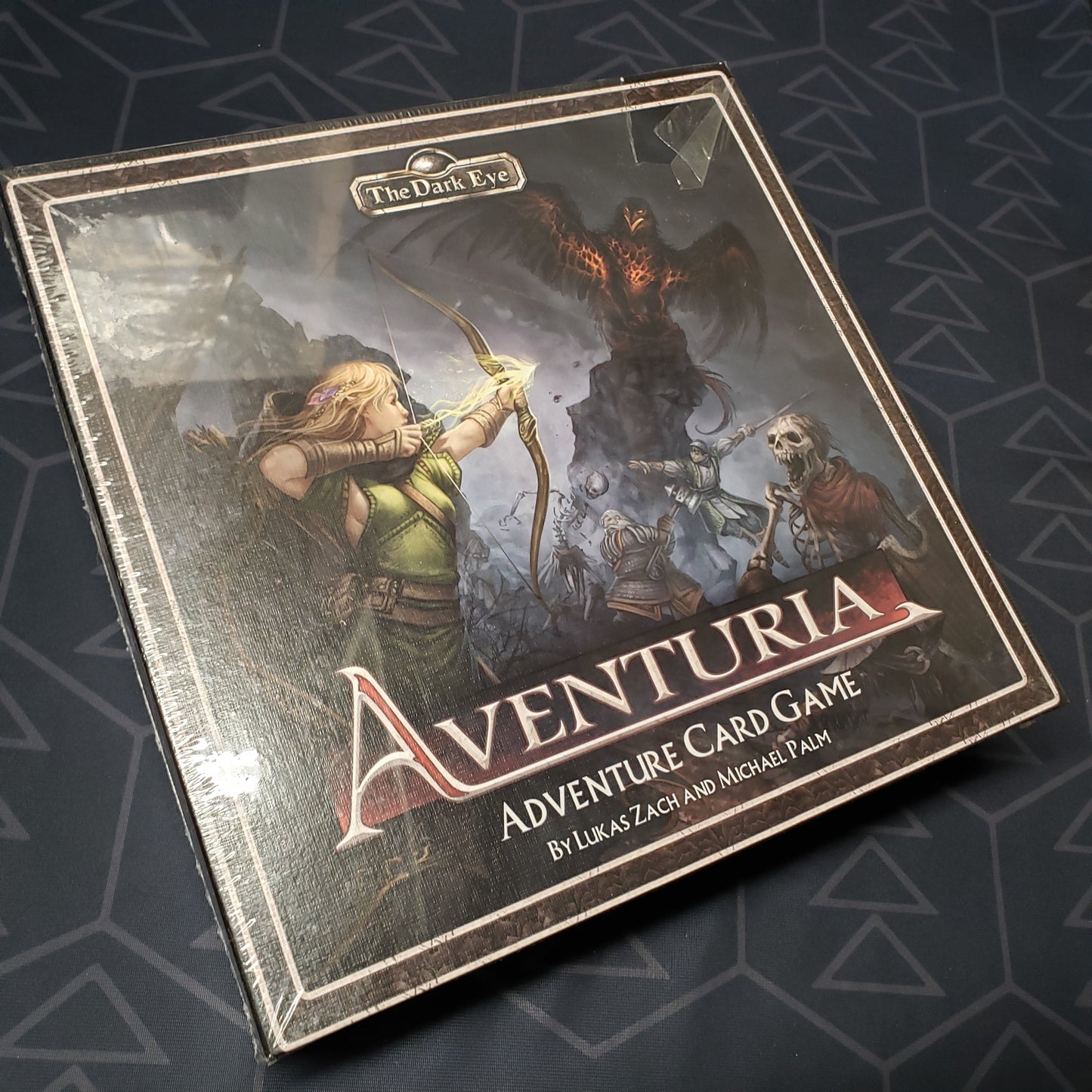 Image shows the front cover of the box of the Aventuria: Adventure Card Game