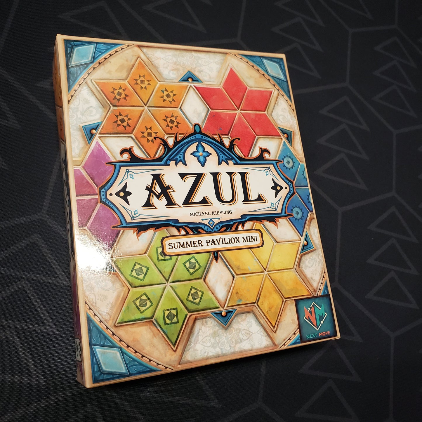 Image shows the front cover of the box for the Azul: Summer Pavilion Mini board game