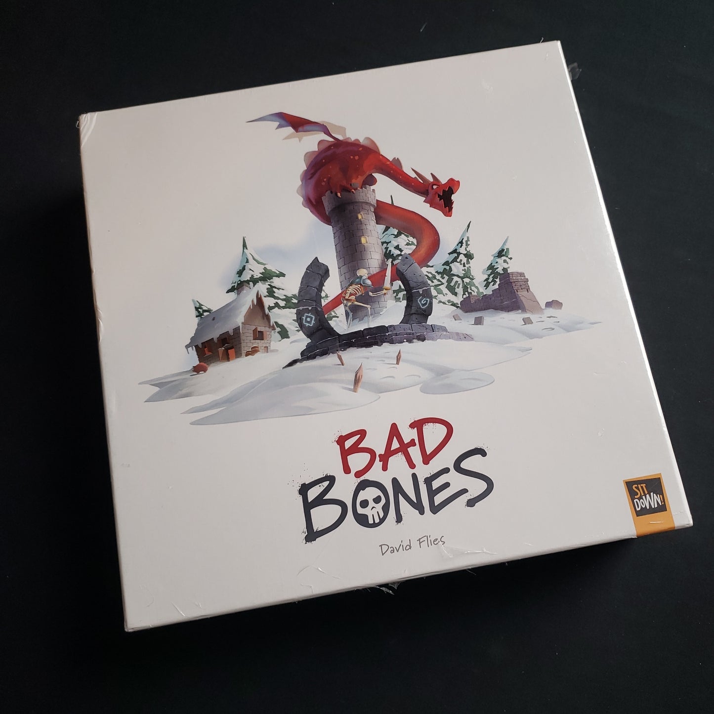 Image shows the front cover of the box of the Bad Bones board game