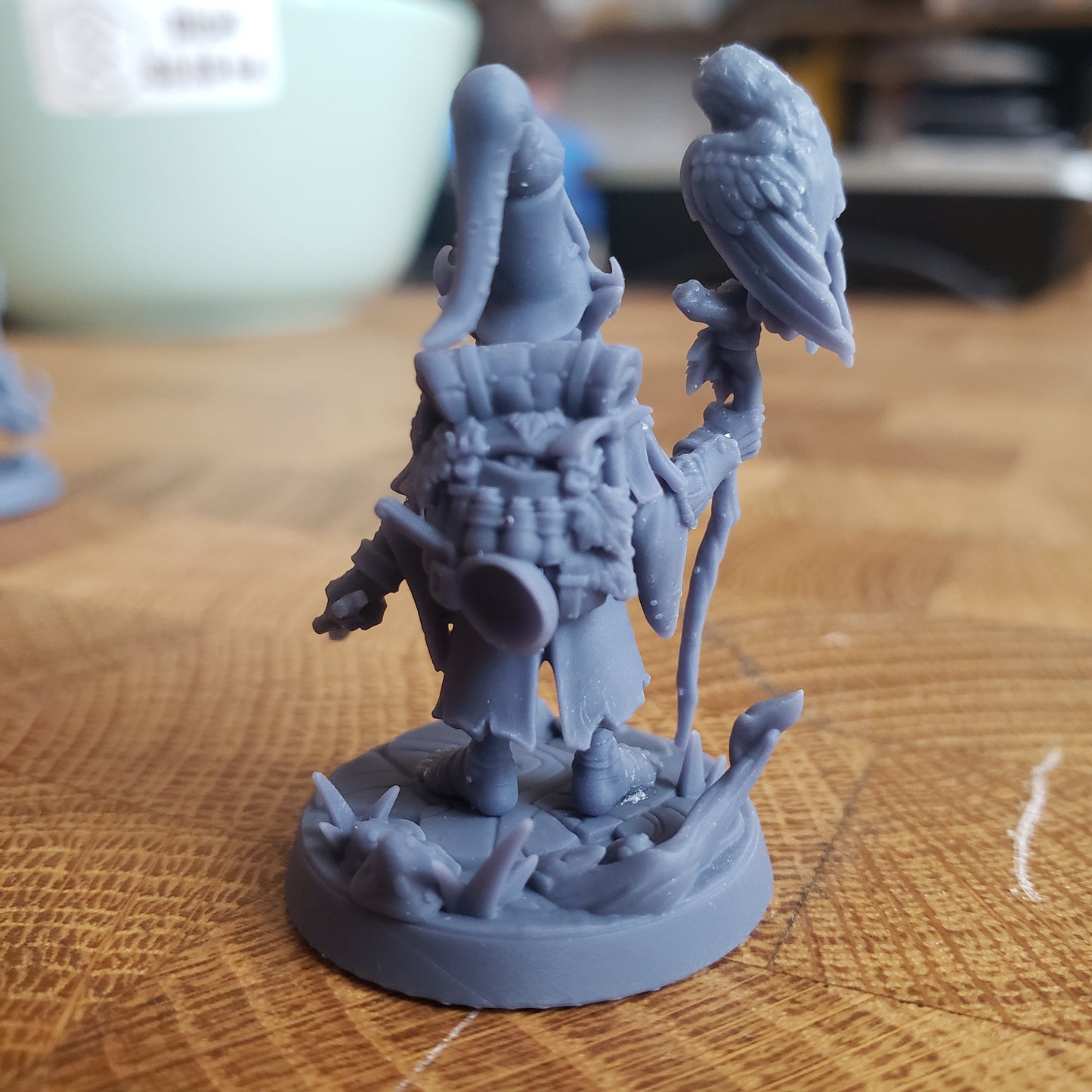 Image is a photo of a 3D printed gnome wizard gaming miniature printed in-house at All Systems Go