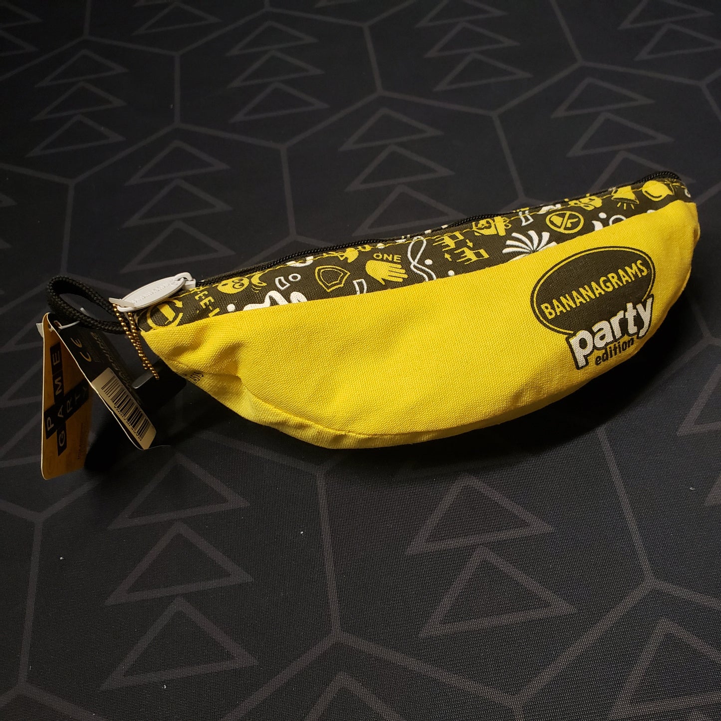 Image shows the banana-shaped pouch for the Bananagrams: Party Edition board game