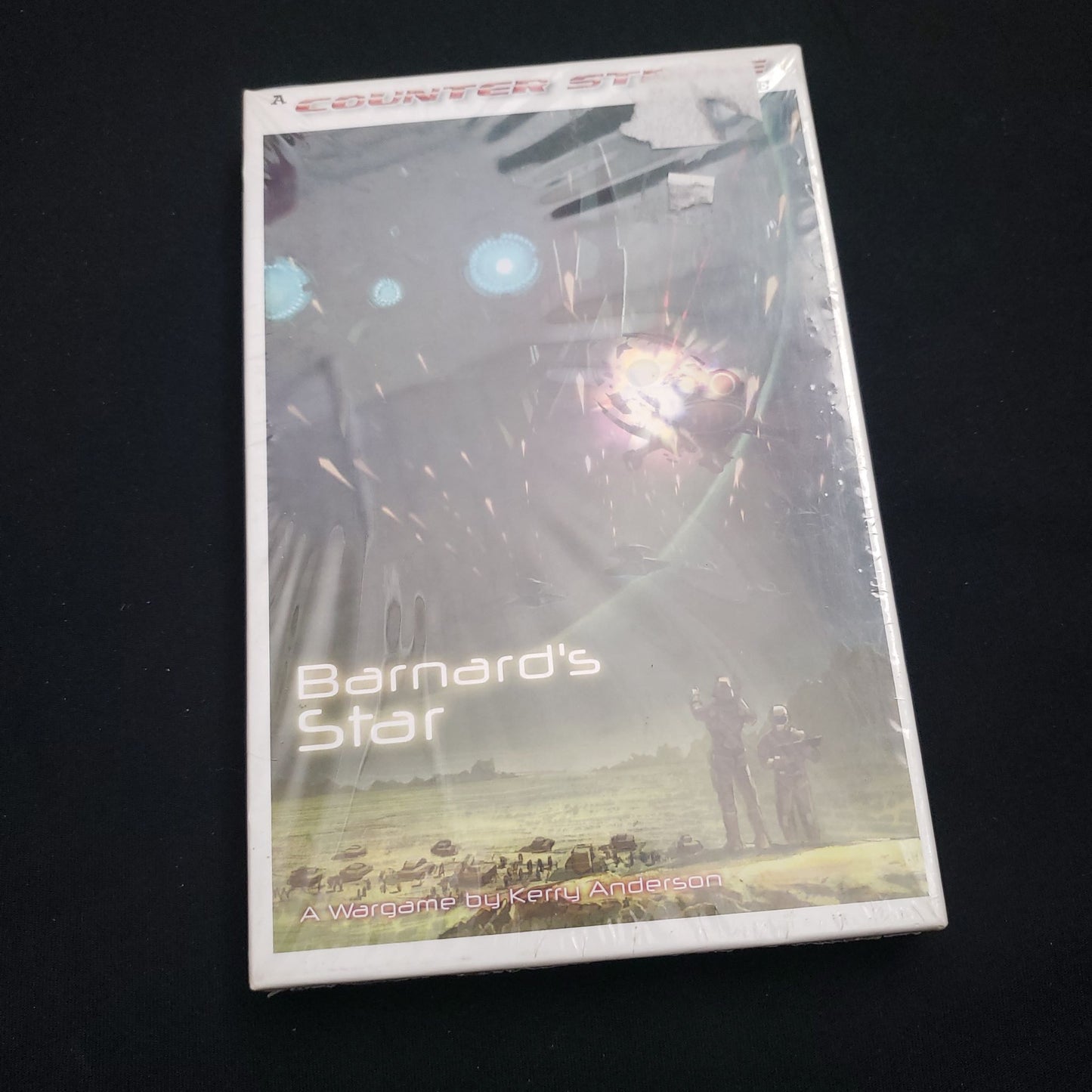 Image shows the front cover of the box of the Barnard's Star board game