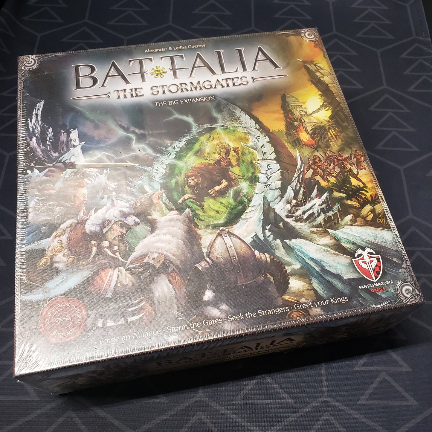 Image shows the front cover of the box of the Stormgates expansion for the board game Battalia