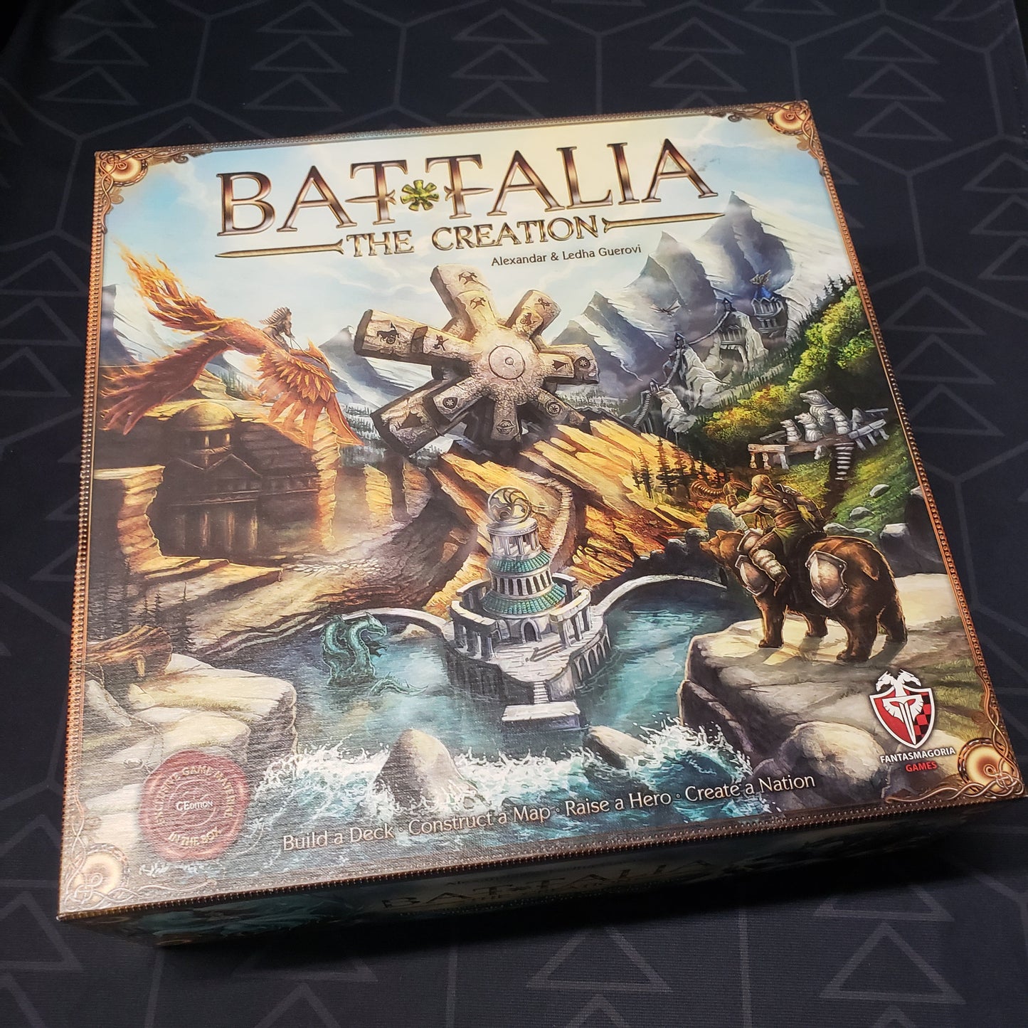 Image shows the front cover of the box for the Battalia: The Creation board game
