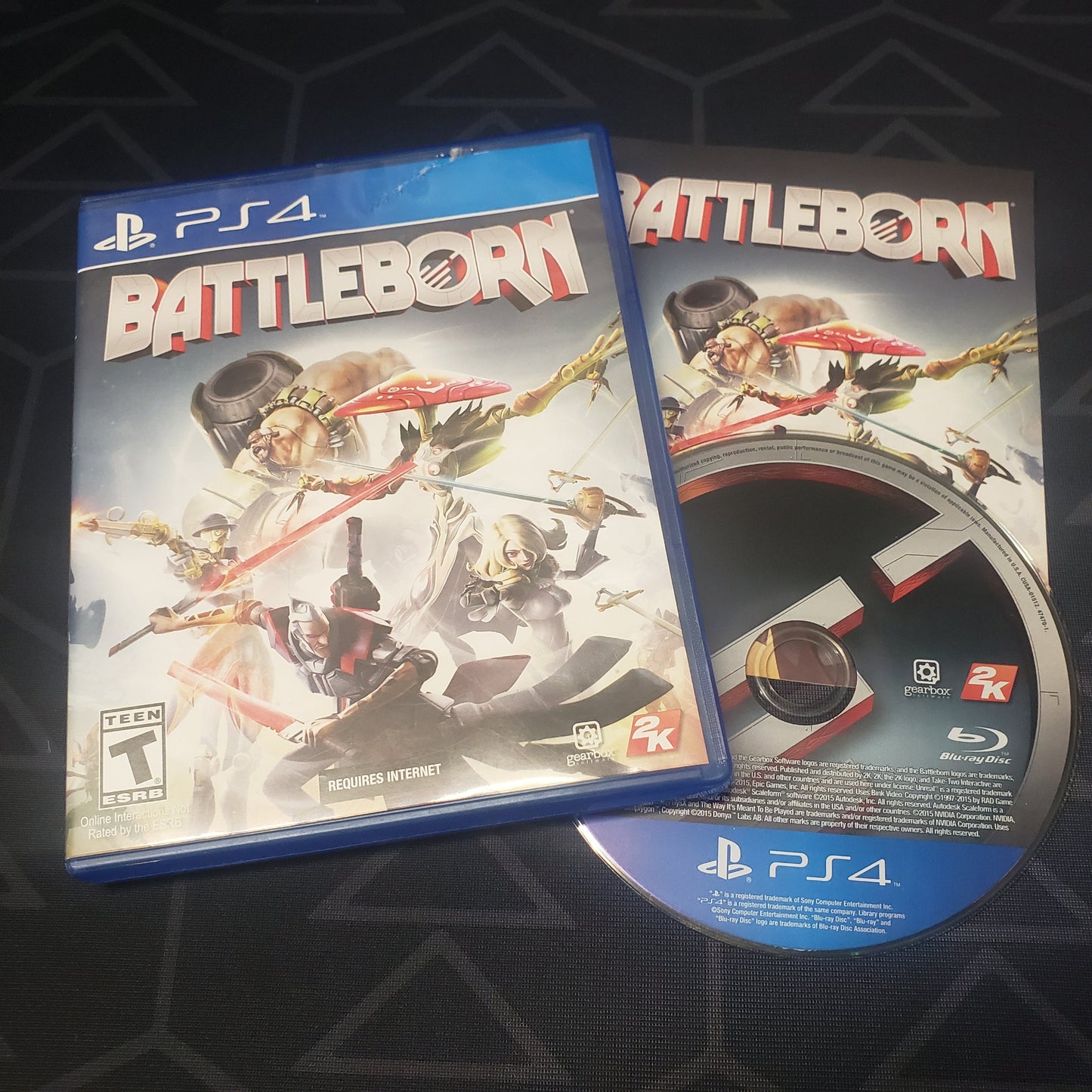 Image shows the case, manual & disc for the video game Battleborn for Playstation 4