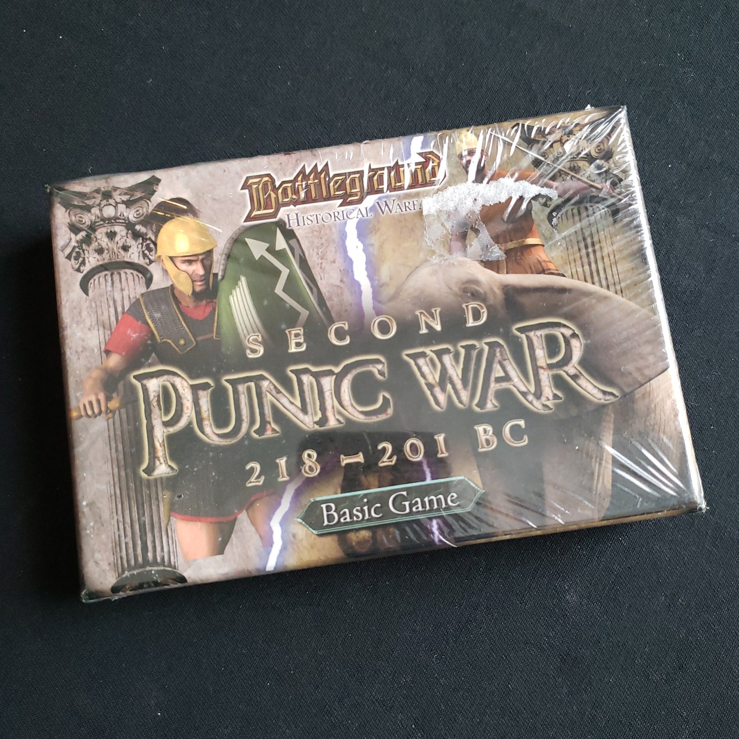 Image shows the front cover of the box of the card game Battleground Historical Warfare: Second Punic War 218-201 BC