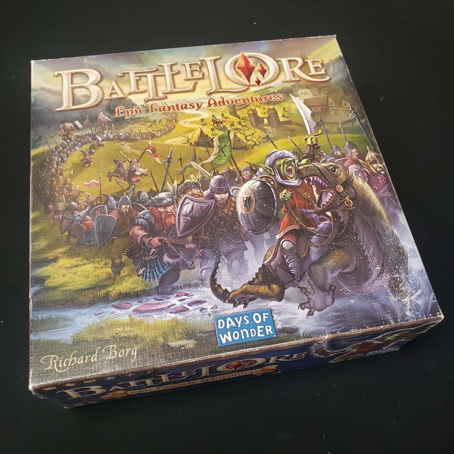 Image shows the front cover of the box of the Battlelore board game